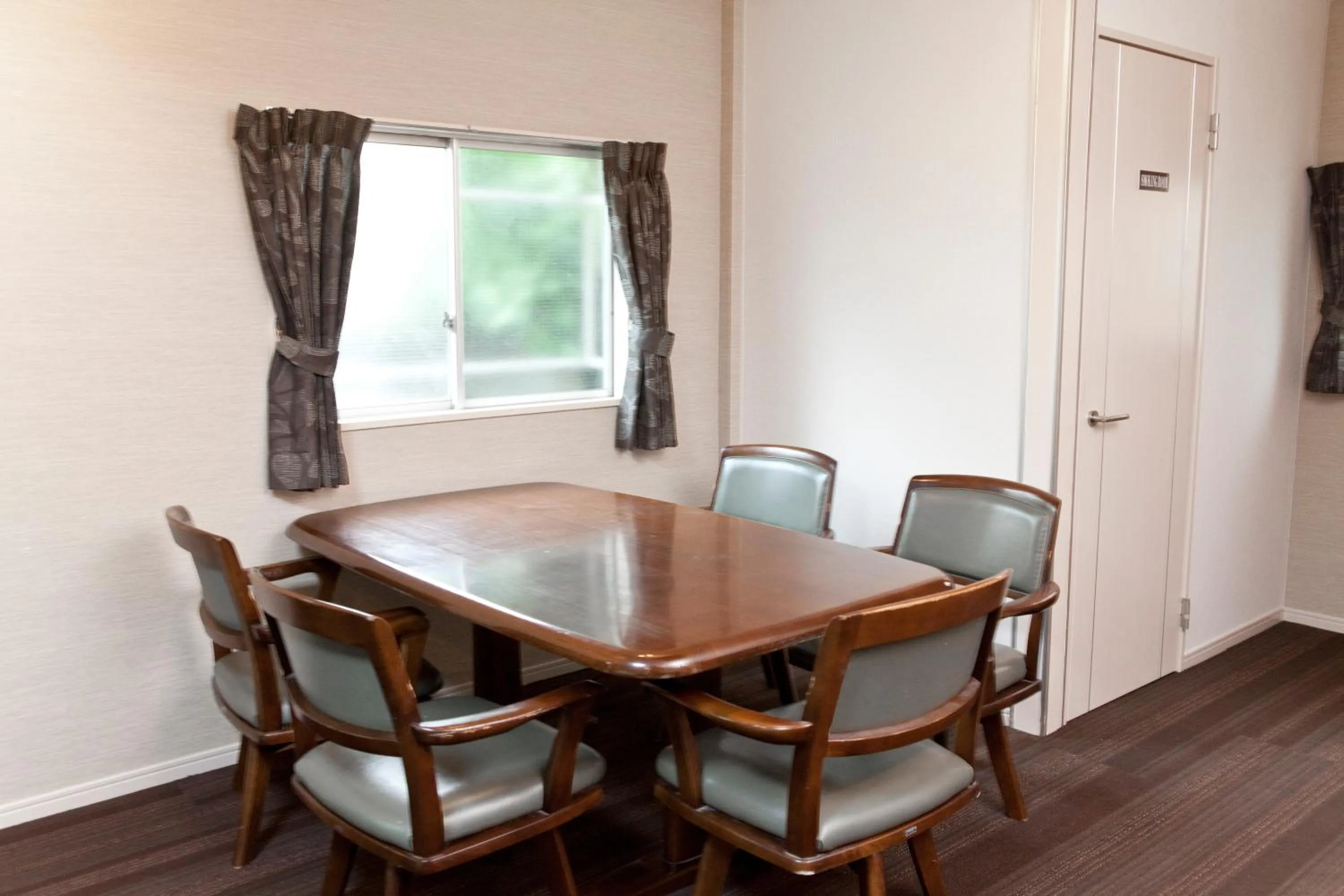 Communal lounge/ TV room in The Shin-Okubo International Hotel