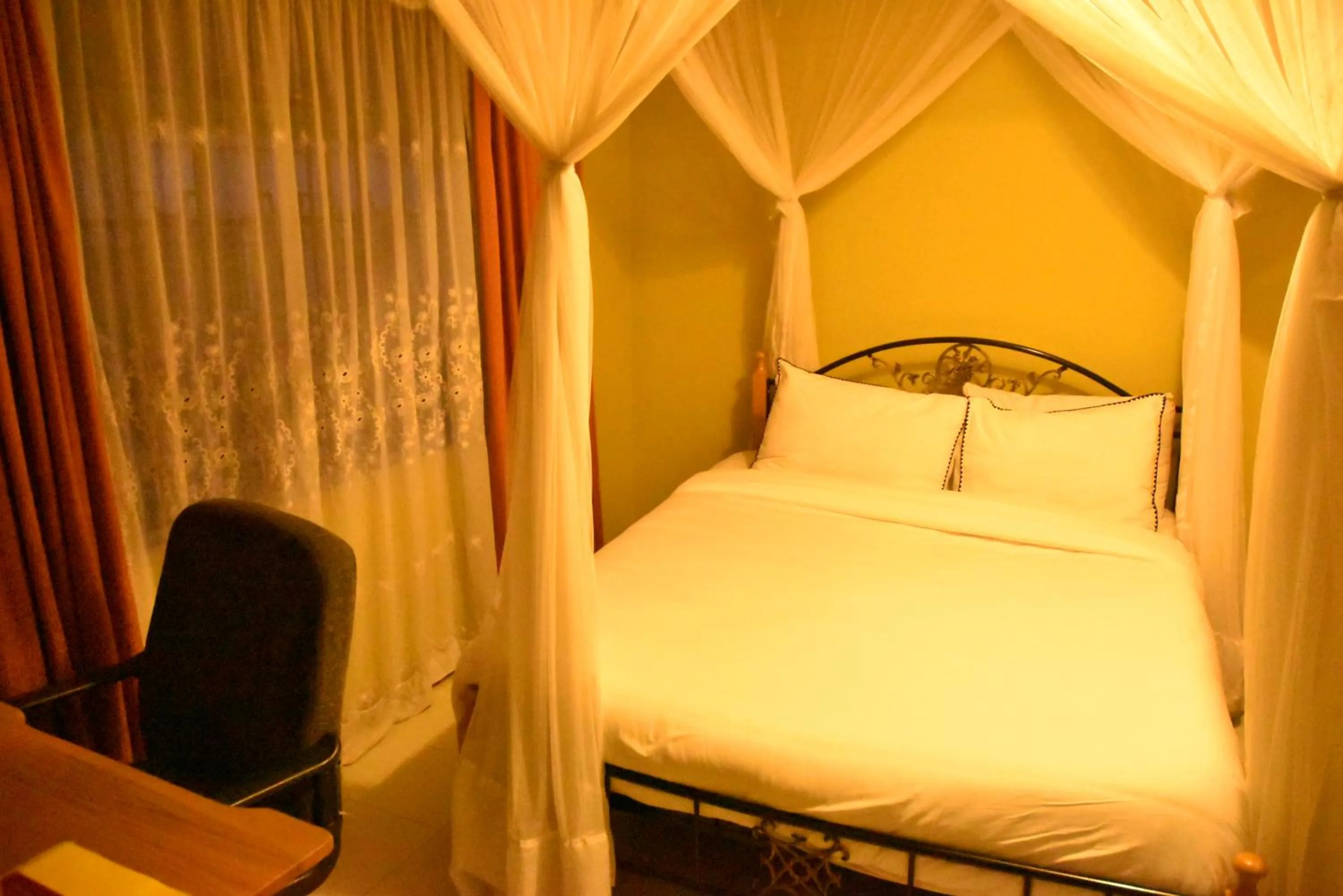 Bedroom in Wagon Wheel Hotel Eldoret