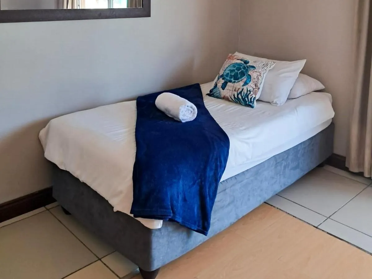 Bed in SeaXplore Lodge & Dive Center