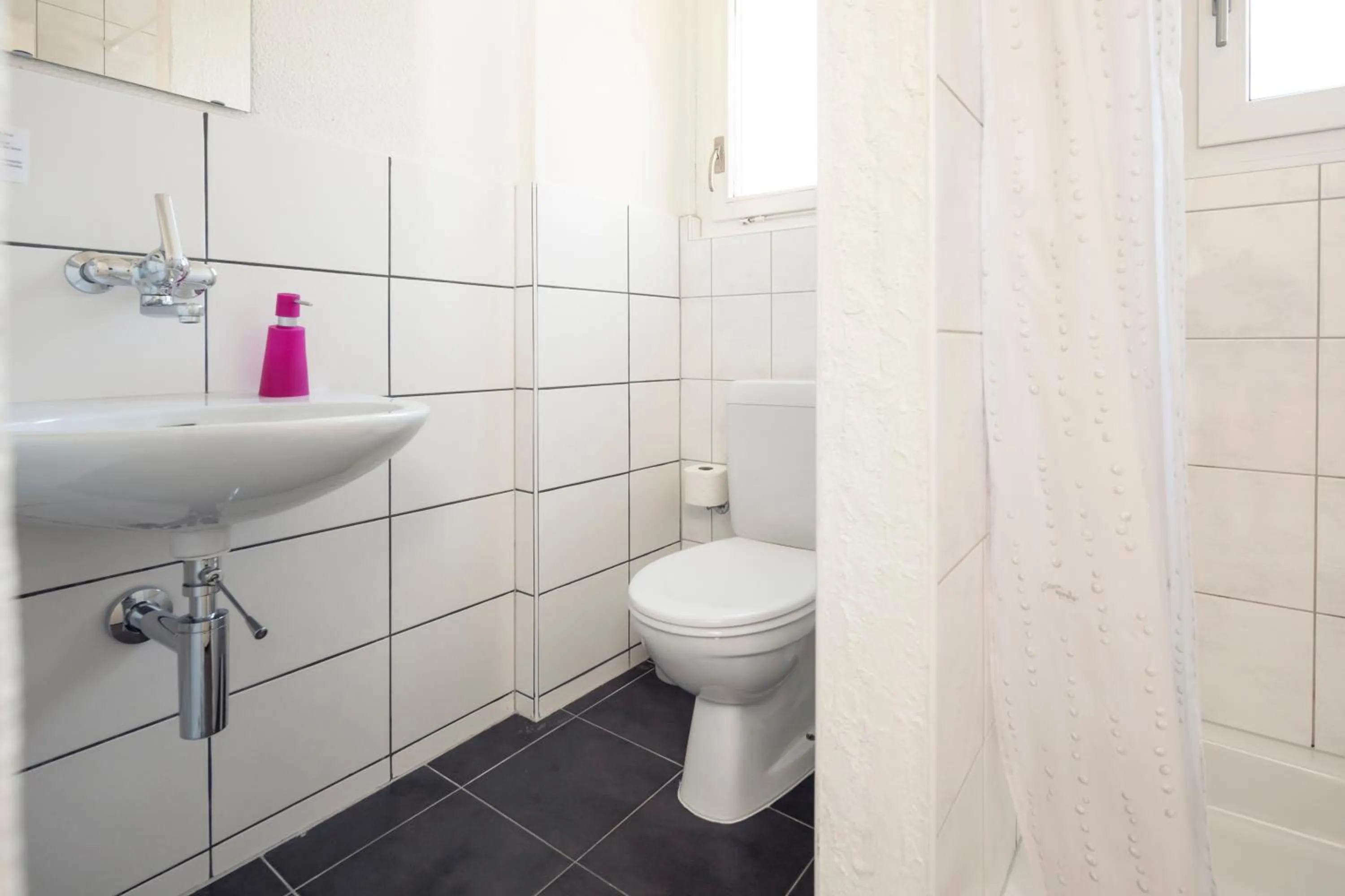 Bathroom in Alpenkräuter Hotel Bären