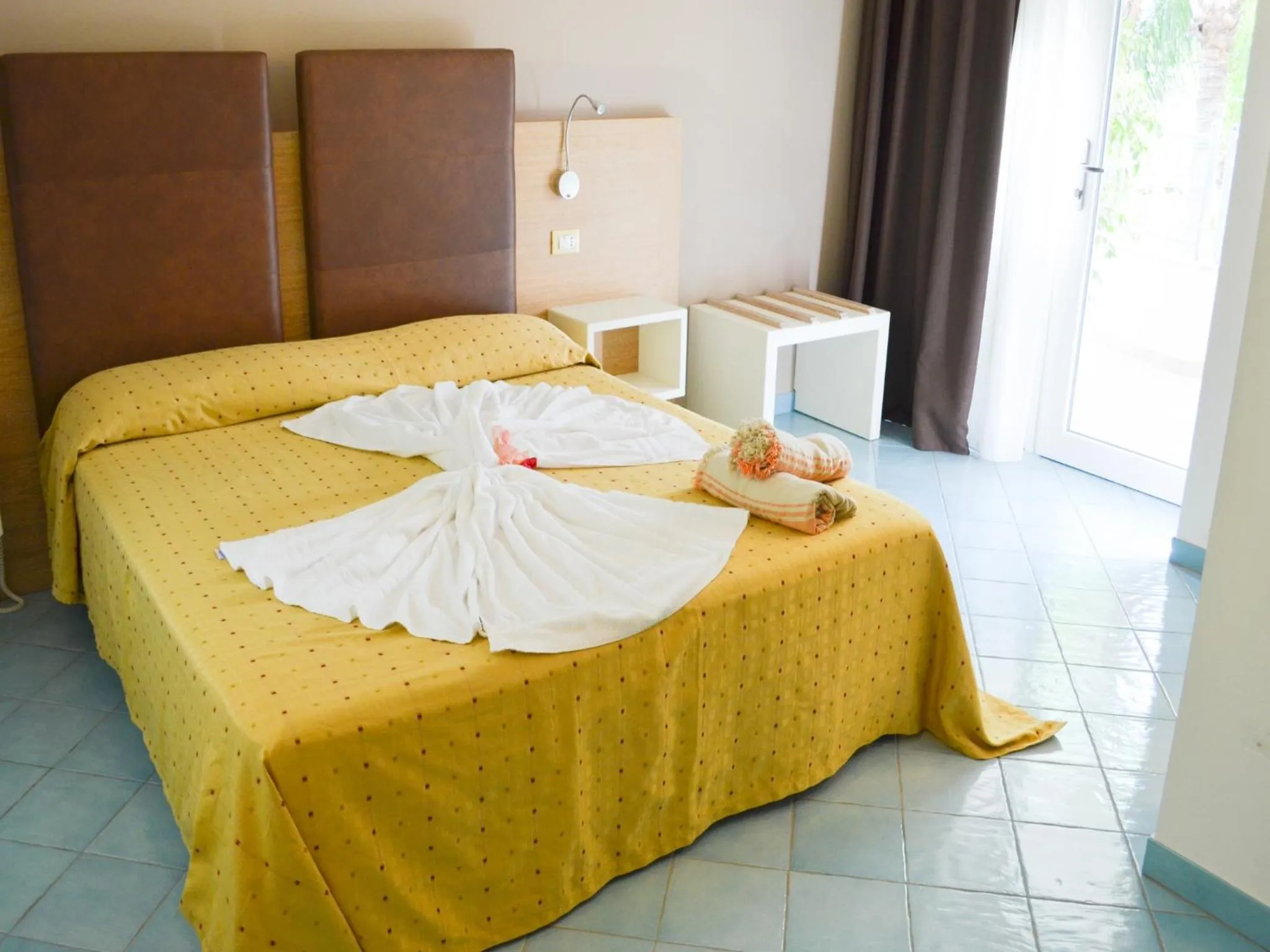 Bed in Baia del Godano Resort & Spa