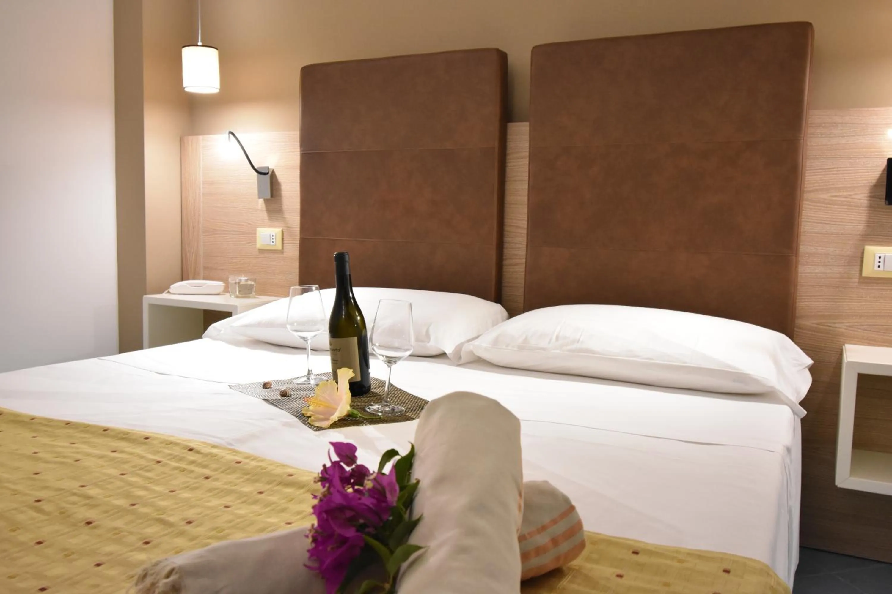 Photo of the whole room, Bed in Baia del Godano Resort & Spa