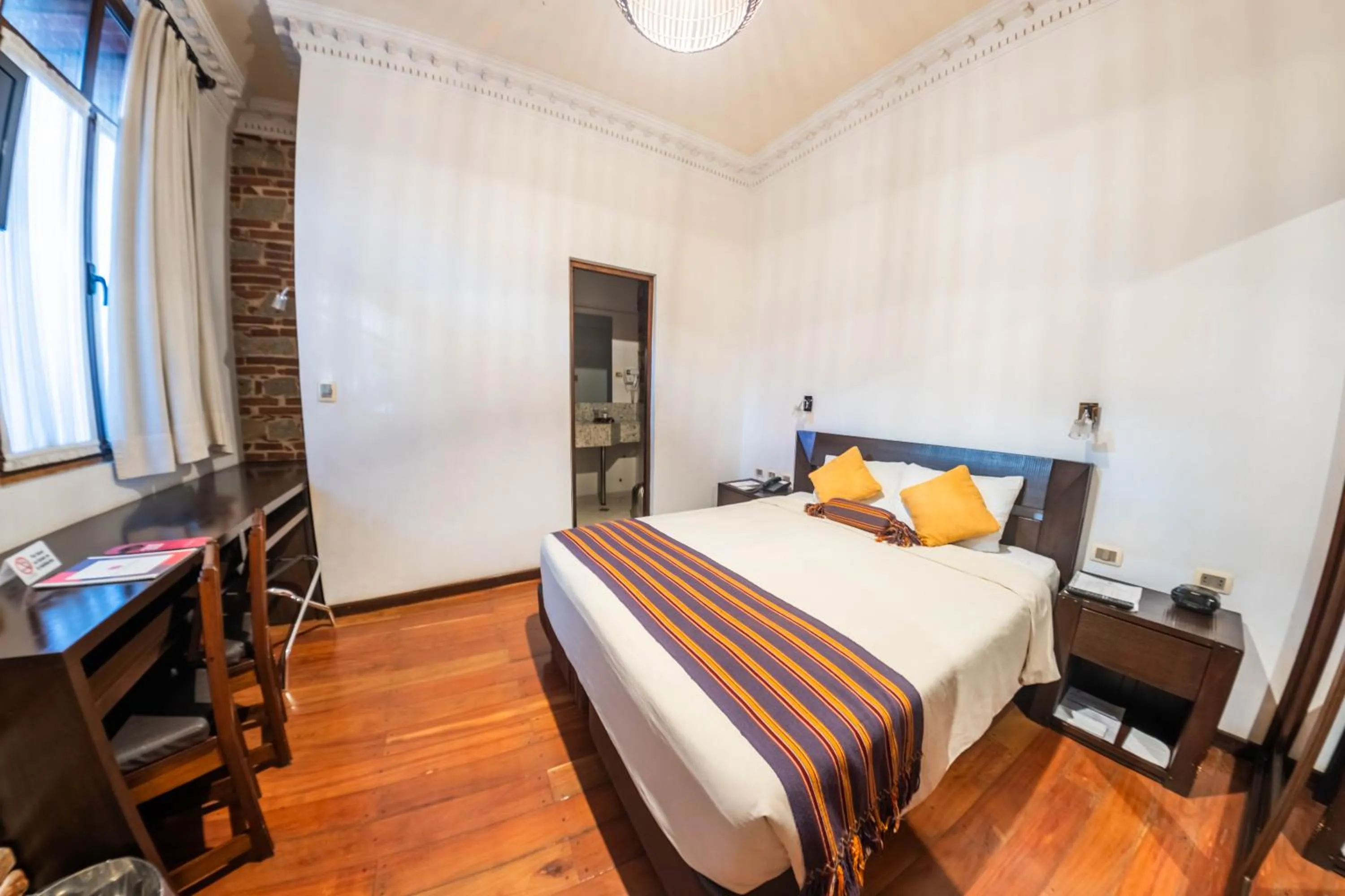 Bed in La Casona Hotel Boutique