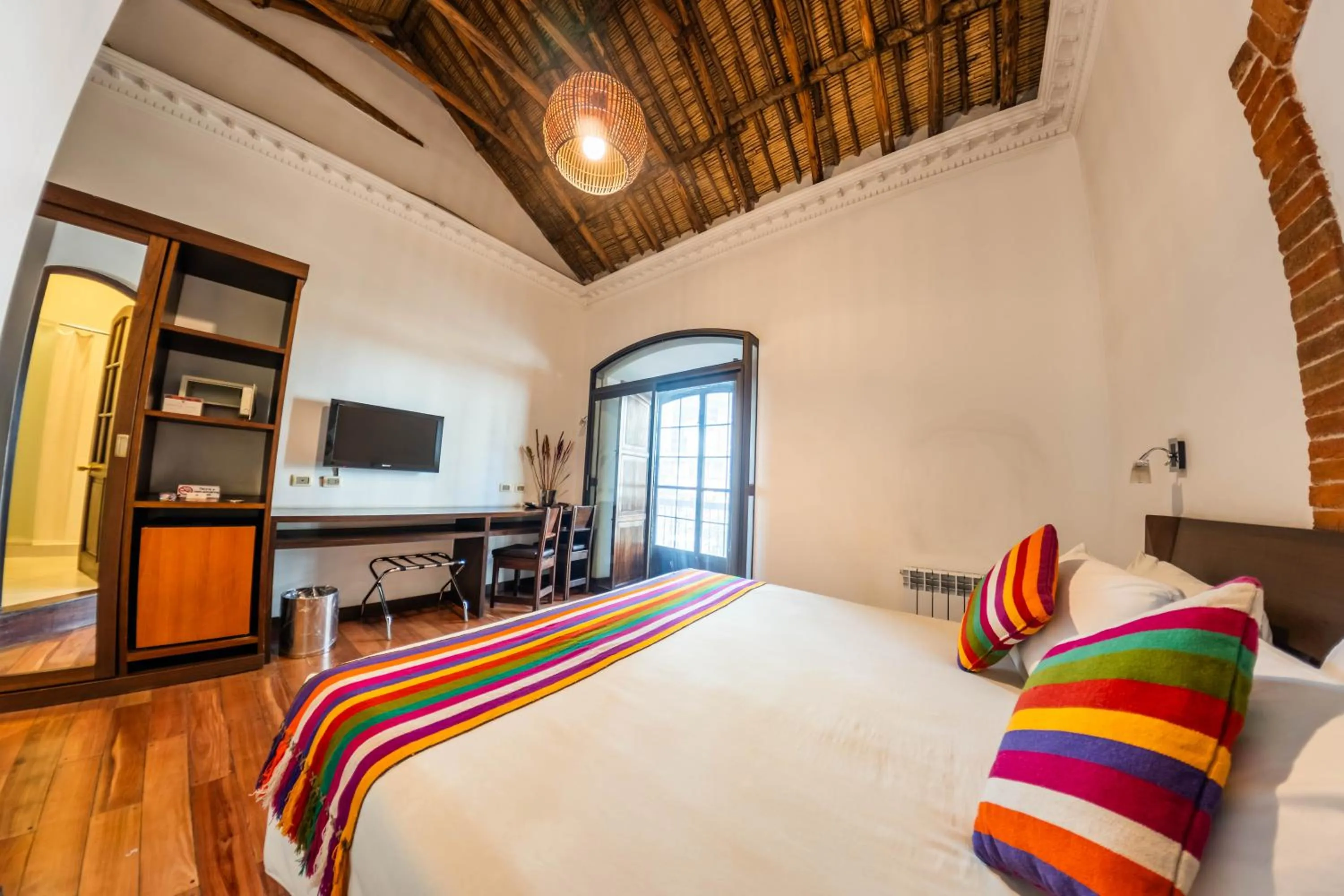 Bed in La Casona Hotel Boutique
