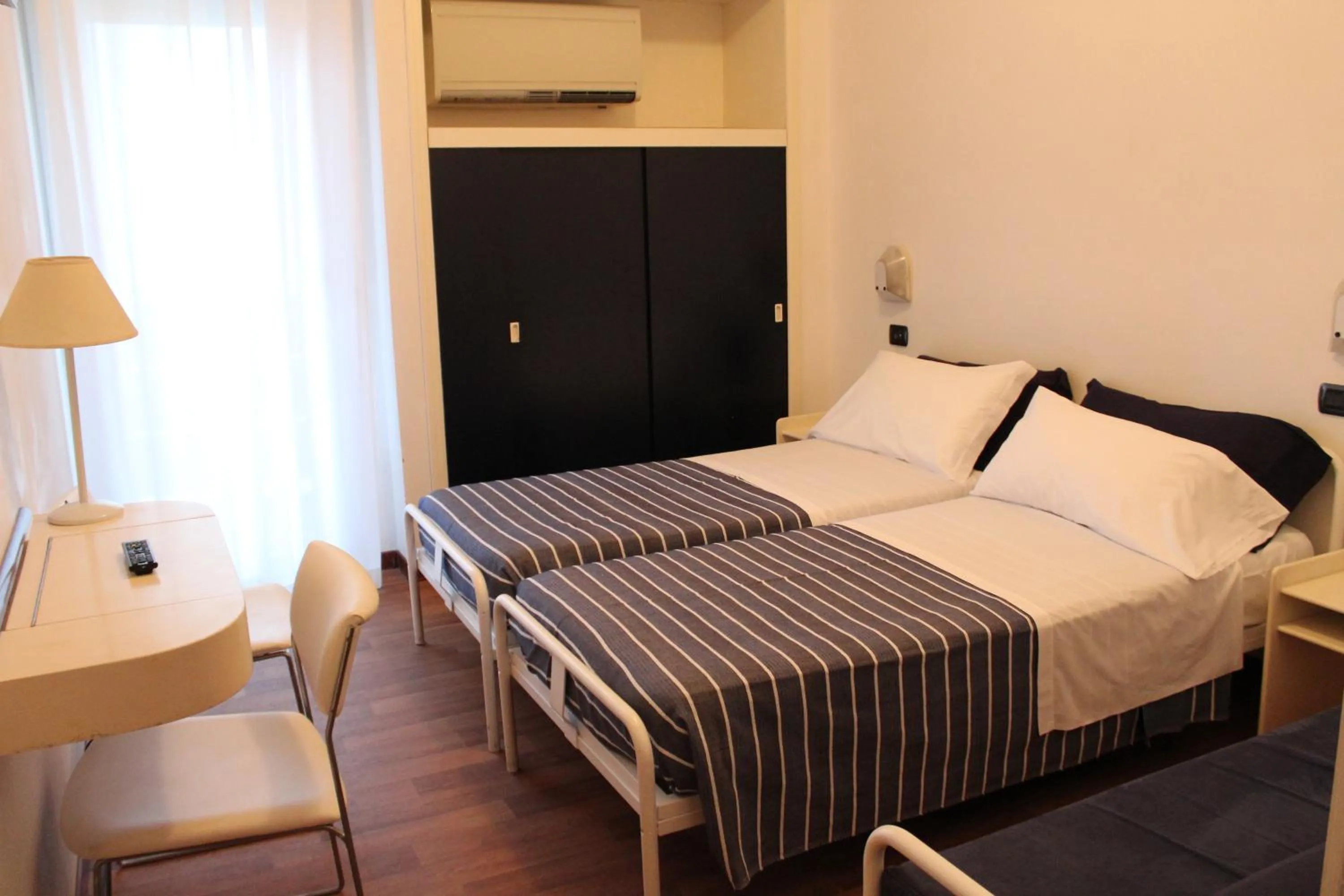 Bed in Hotel Nettuno
