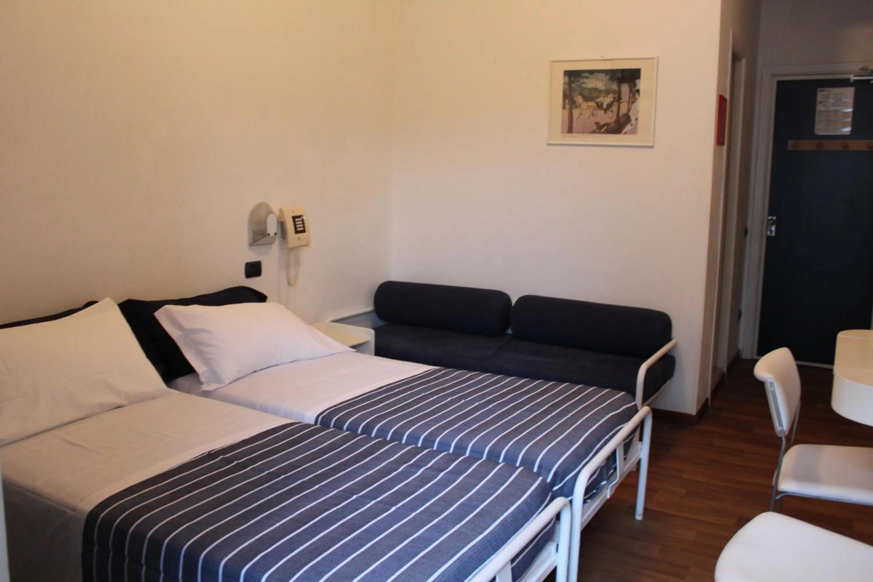 Bed in Hotel Nettuno