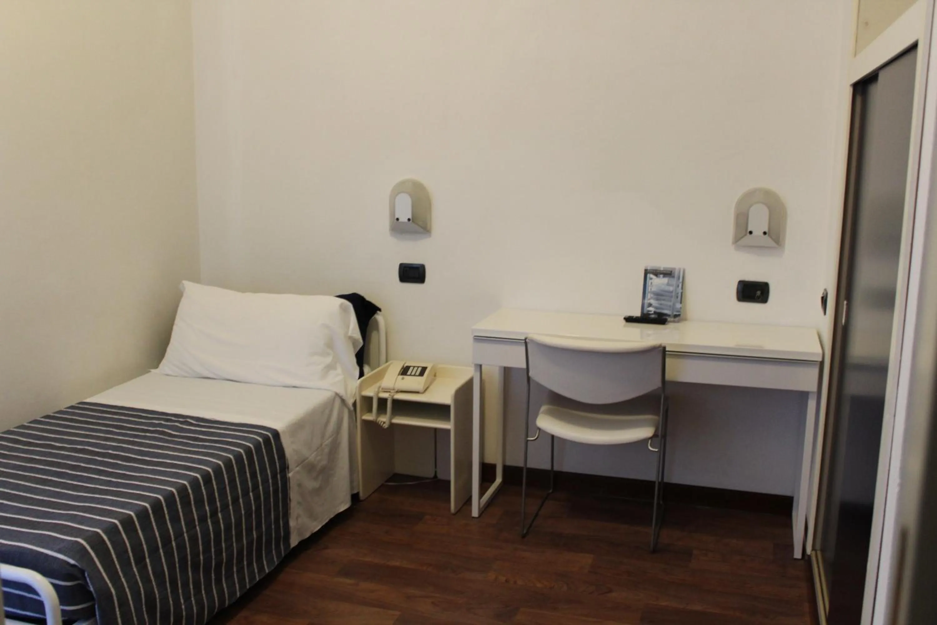 Bed in Hotel Nettuno