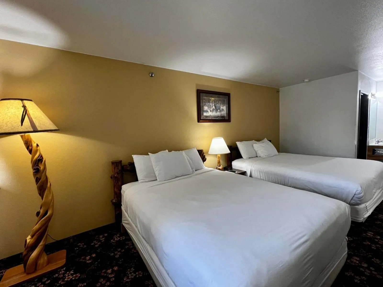 Bed in Buffalo Bill's Antlers Inn