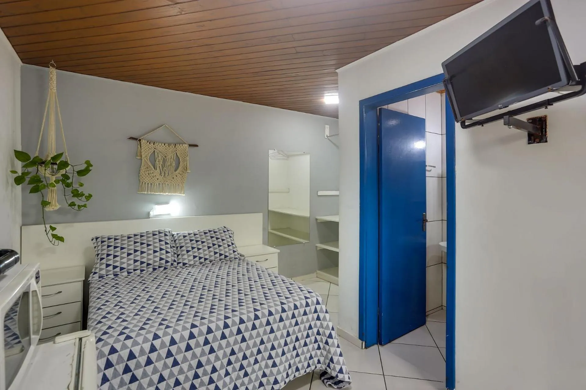 Bed in Pousada Canario Azul