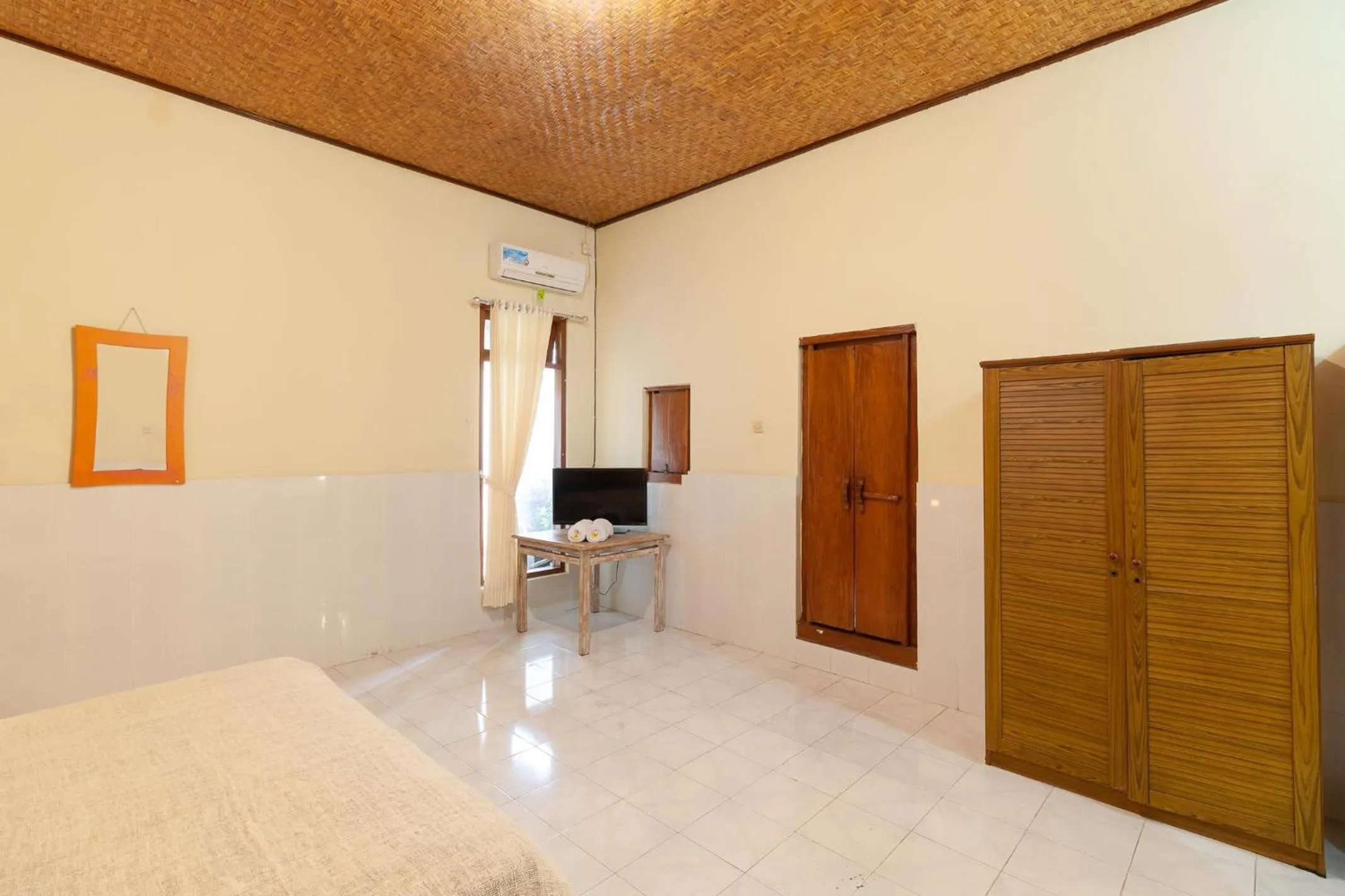 Bedroom in The Guest Villas Legian Kuta