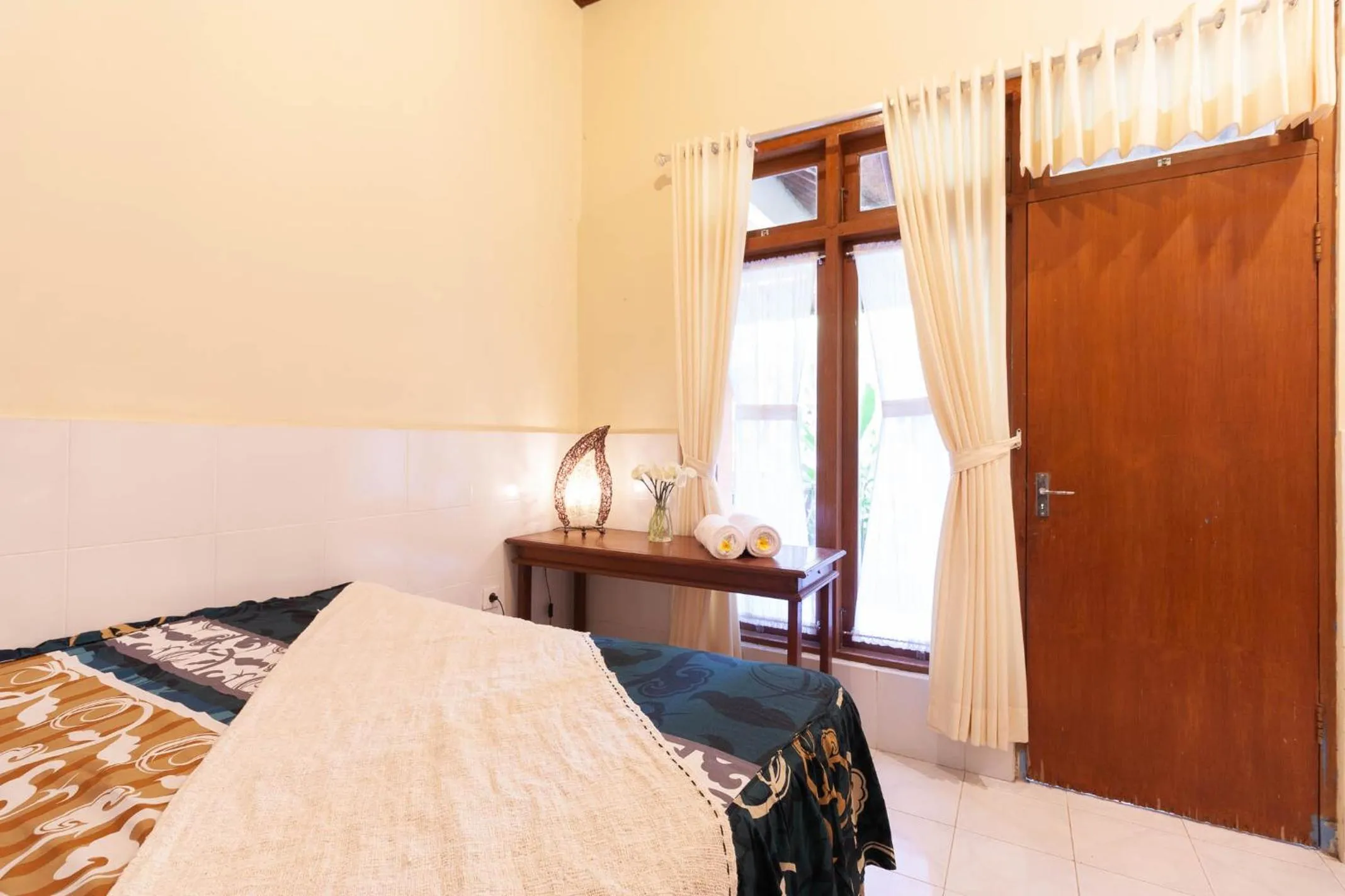 Bedroom in The Guest Villas Legian Kuta