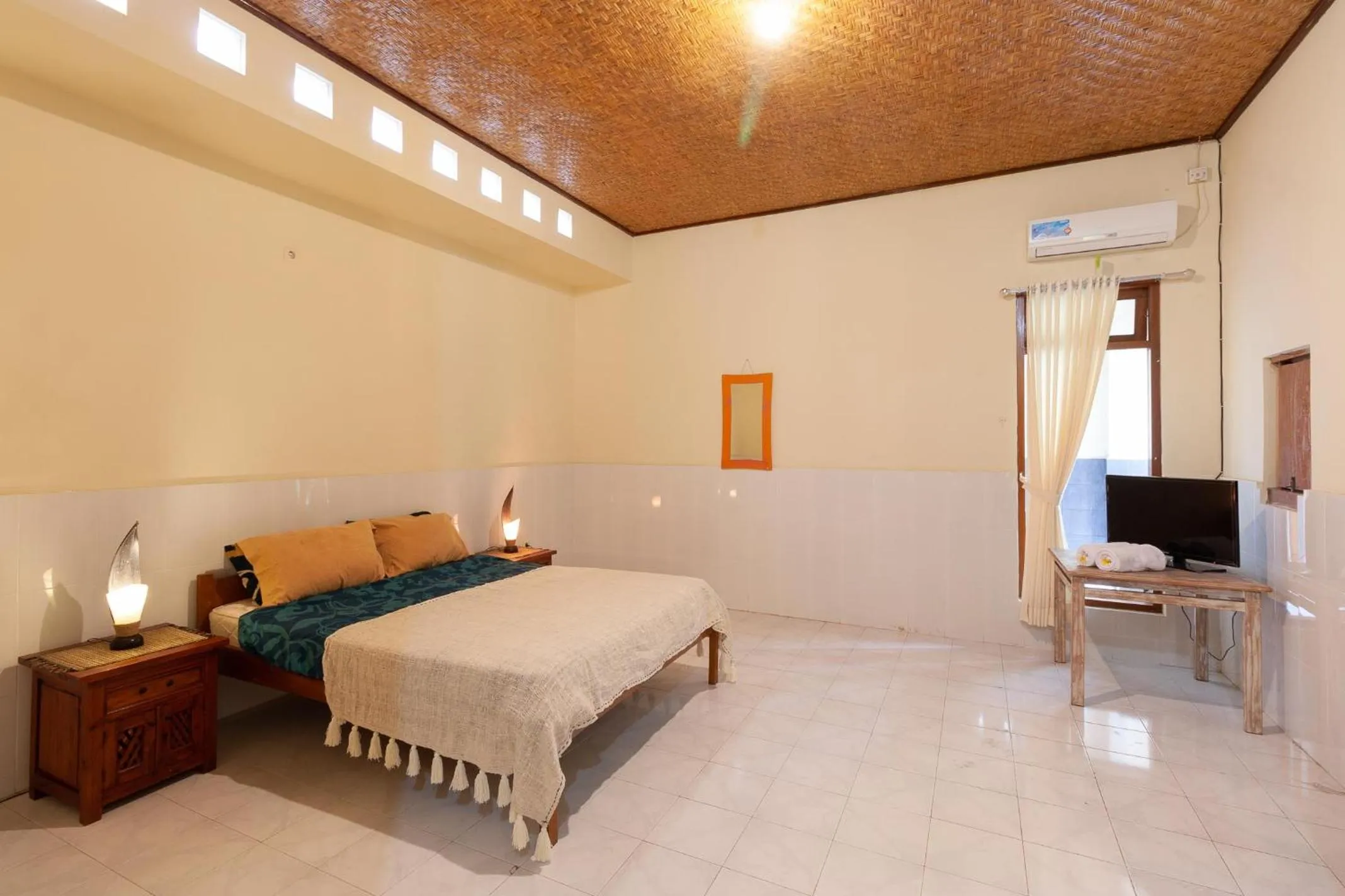 Bedroom in The Guest Villas Legian Kuta