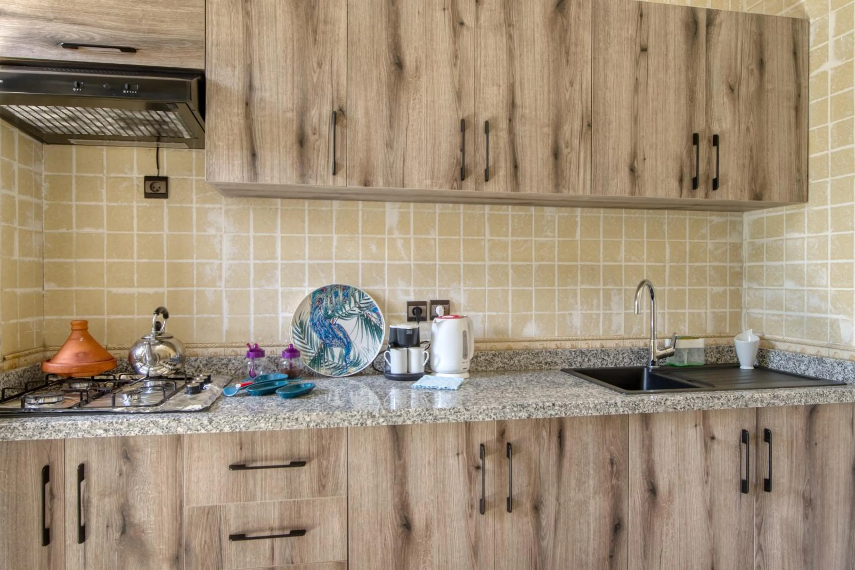 Kitchen or kitchenette in Villas 95 Appart'Hôtel