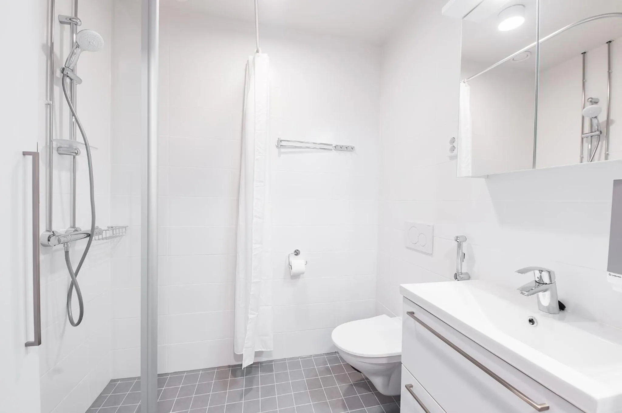 Bathroom in Forenom Aparthotel Helsinki Pikku Huopalahti