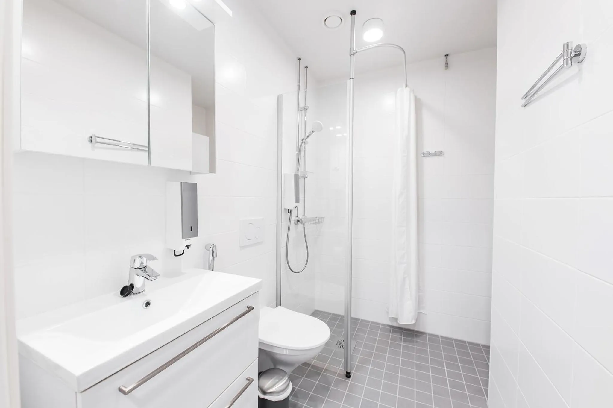 Bathroom in Forenom Aparthotel Helsinki Pikku Huopalahti