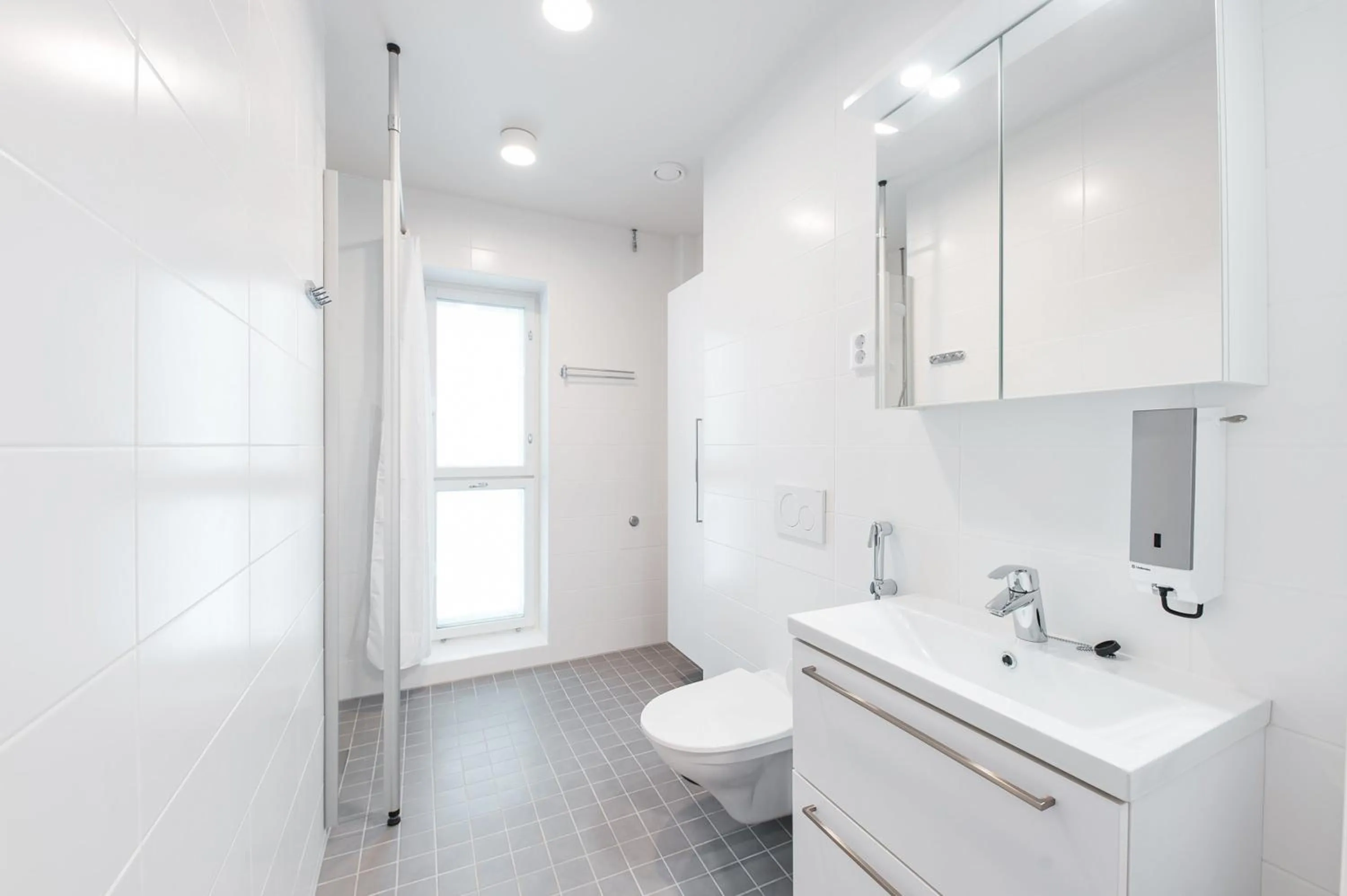 Bathroom in Forenom Aparthotel Helsinki Pikku Huopalahti