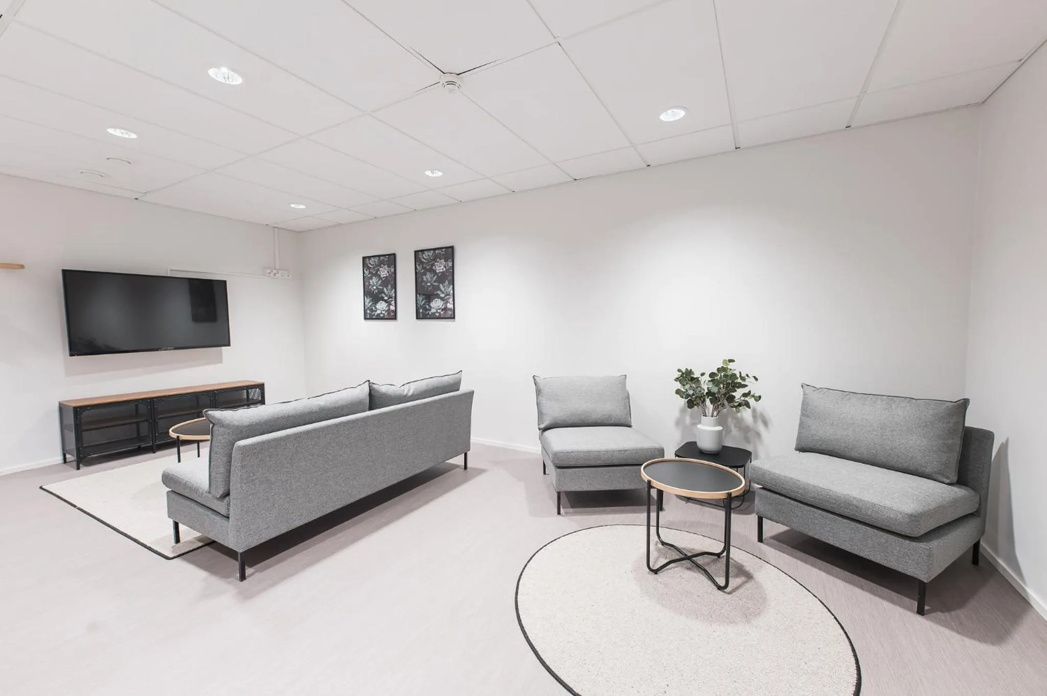 Communal lounge/ TV room in Forenom Aparthotel Helsinki Pikku Huopalahti