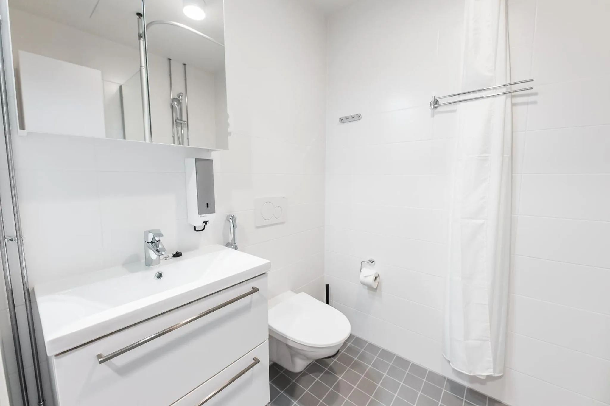 Bathroom in Forenom Aparthotel Helsinki Pikku Huopalahti