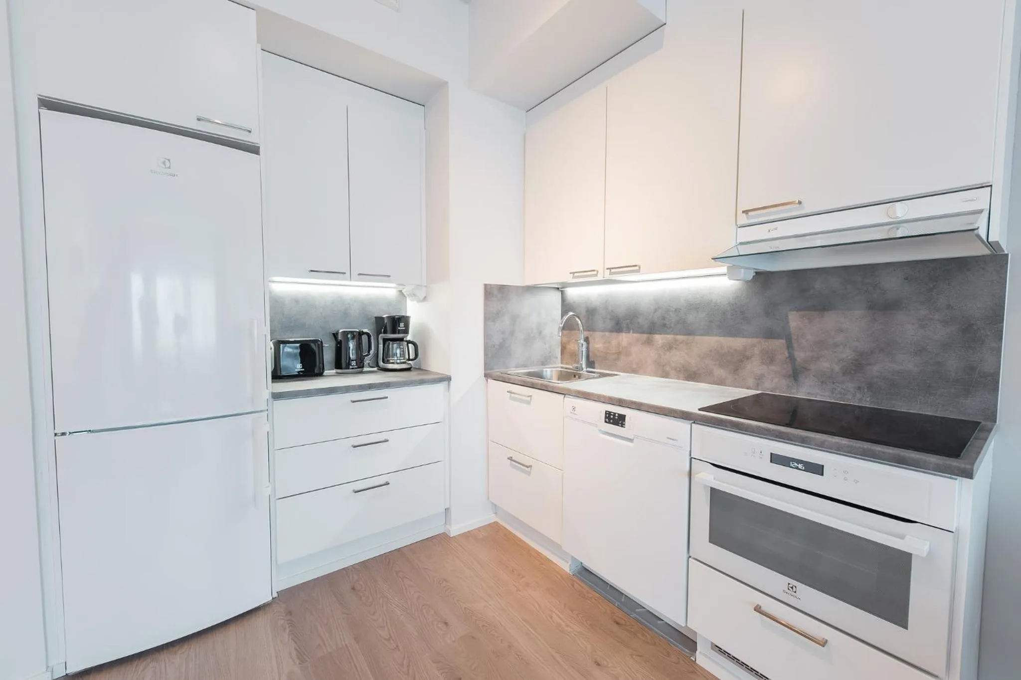 Kitchen or kitchenette in Forenom Aparthotel Helsinki Pikku Huopalahti