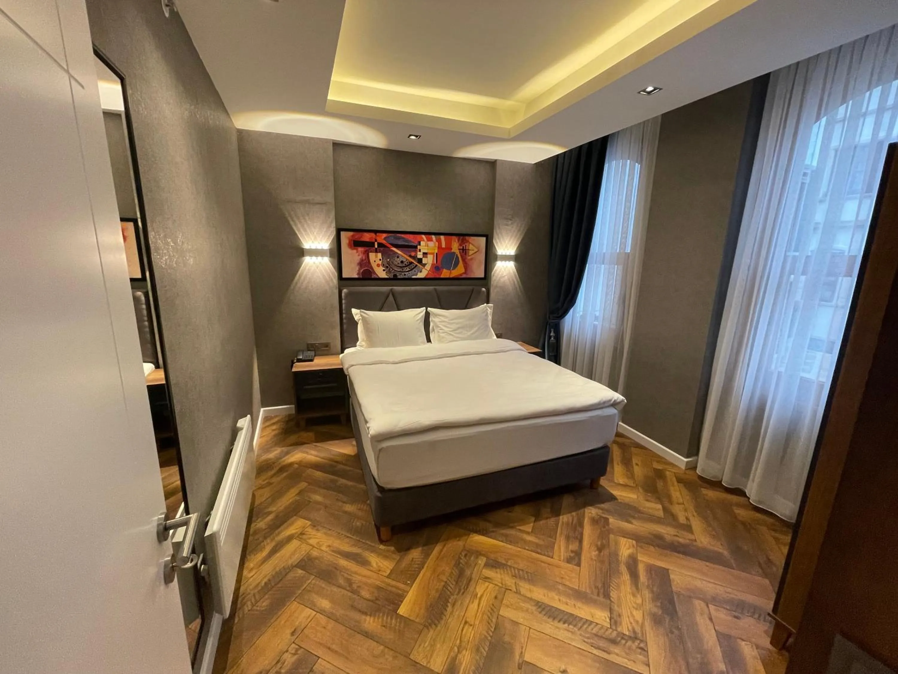 Bed in Feri Suites
