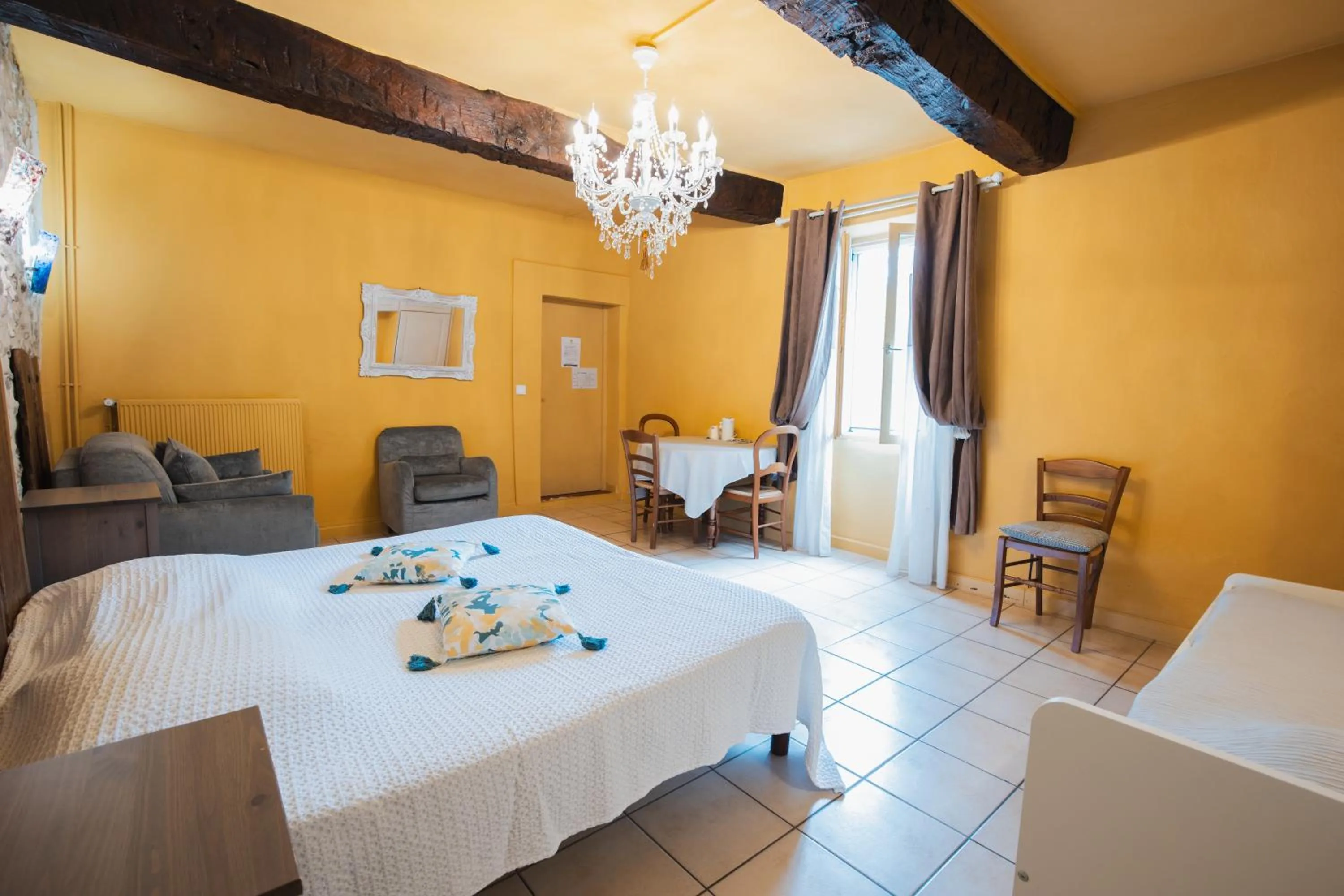 Bedroom in Chambres & Tables d'hôtes Moulin de Lavon
