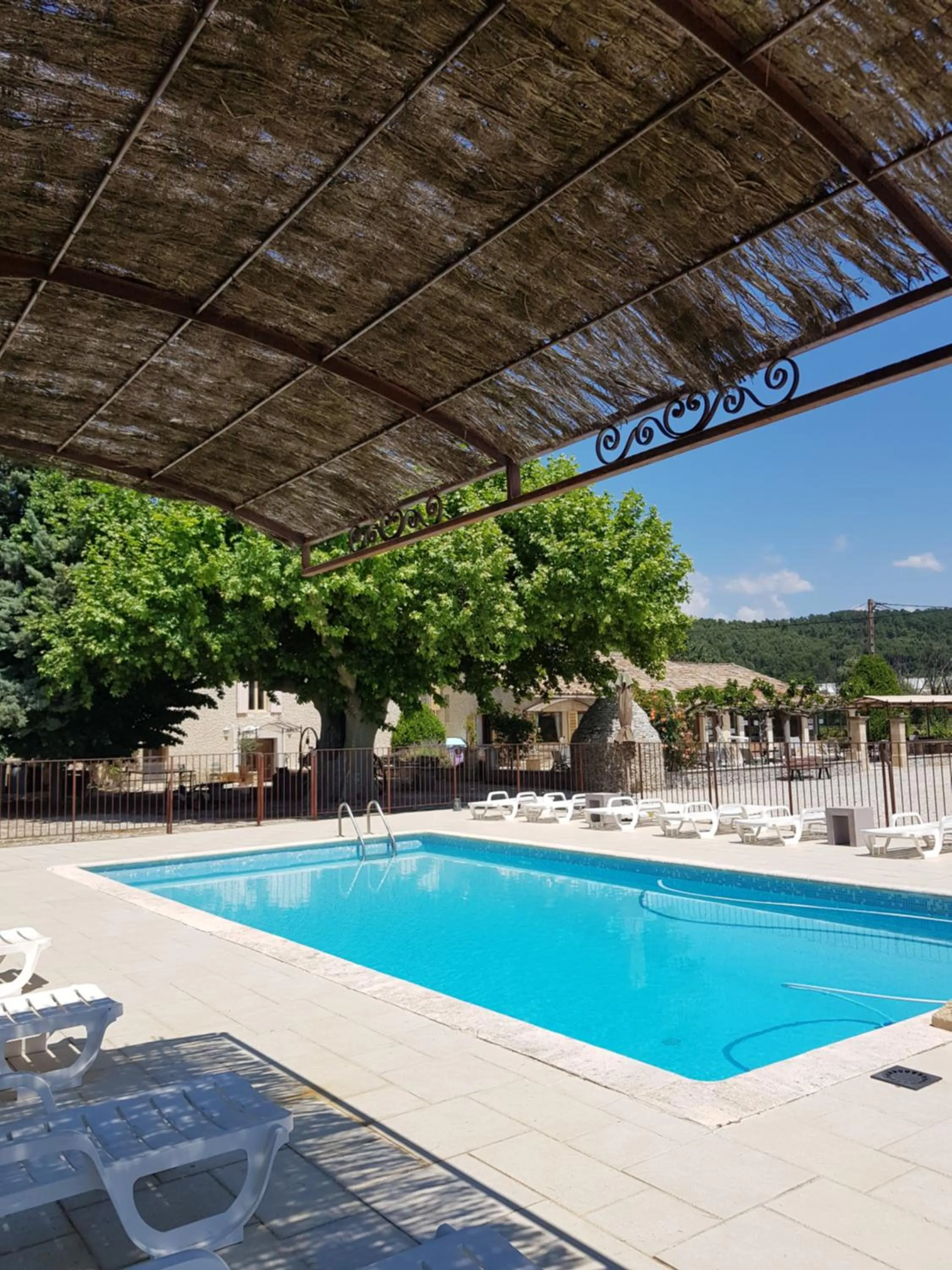 Swimming pool in Chambres & Tables d'hôtes Moulin de Lavon