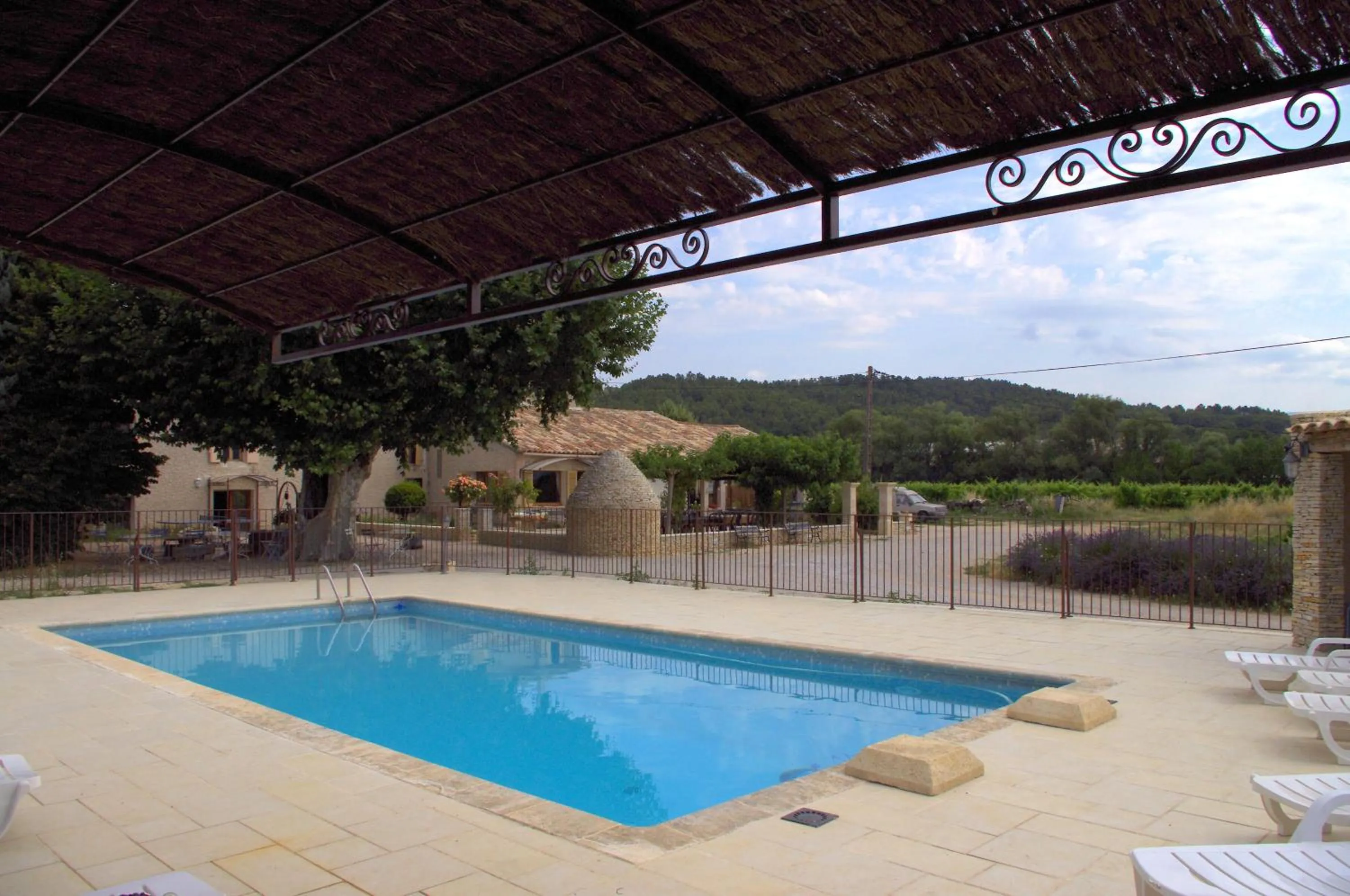 Swimming pool in Chambres & Tables d'hôtes Moulin de Lavon