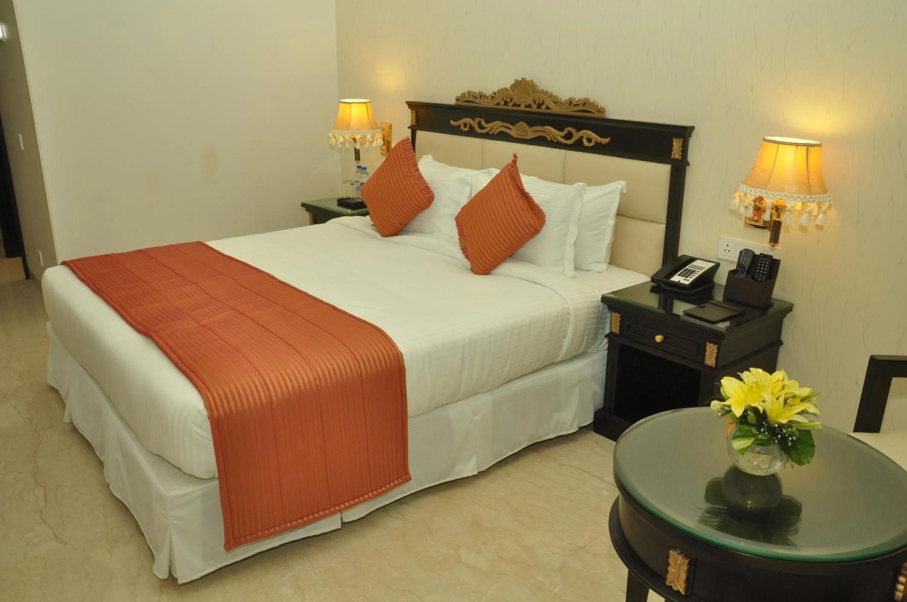 Bed in Royal Tulip Navi Mumbai