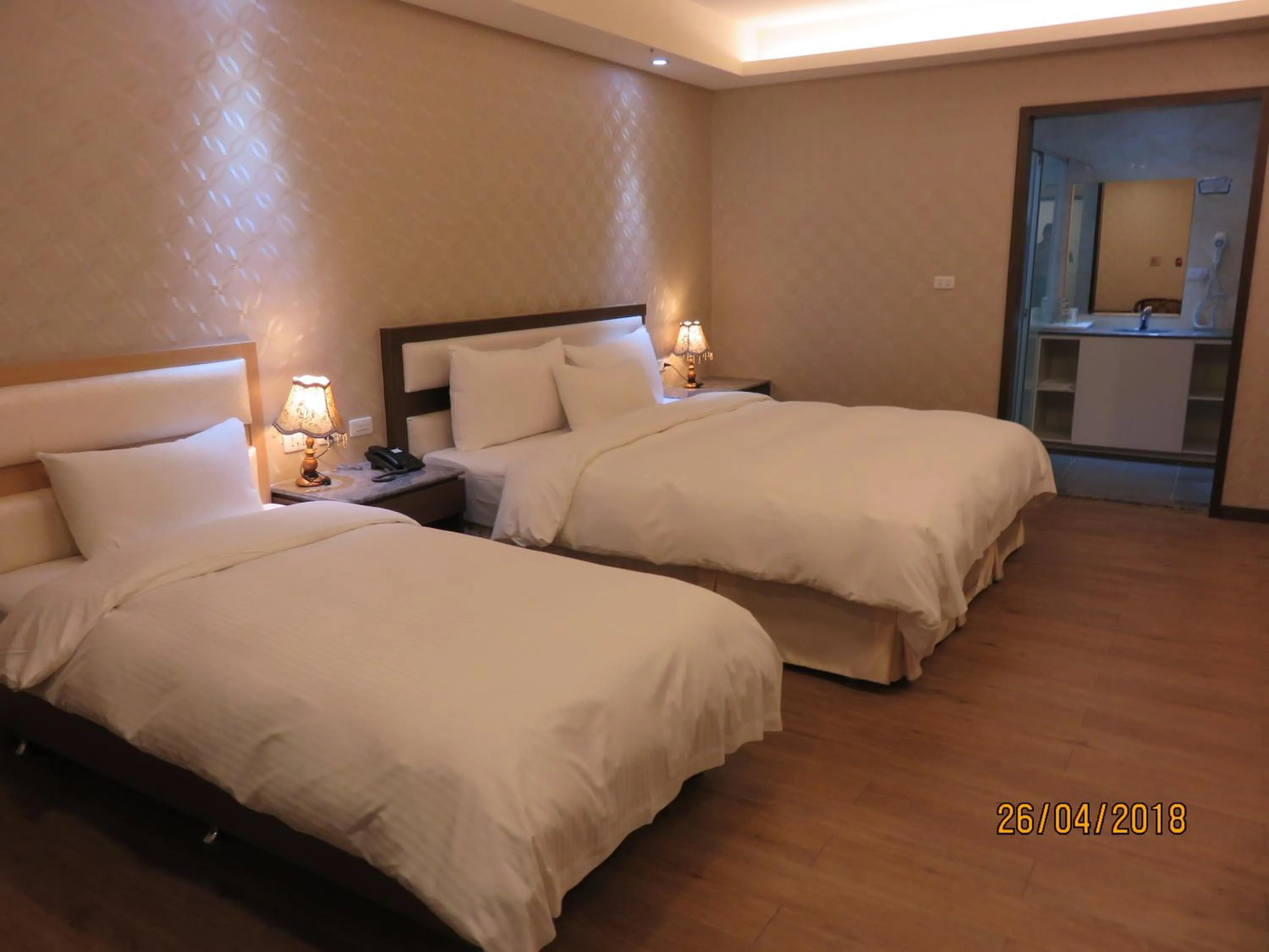 Bed in Mao Hua Motel