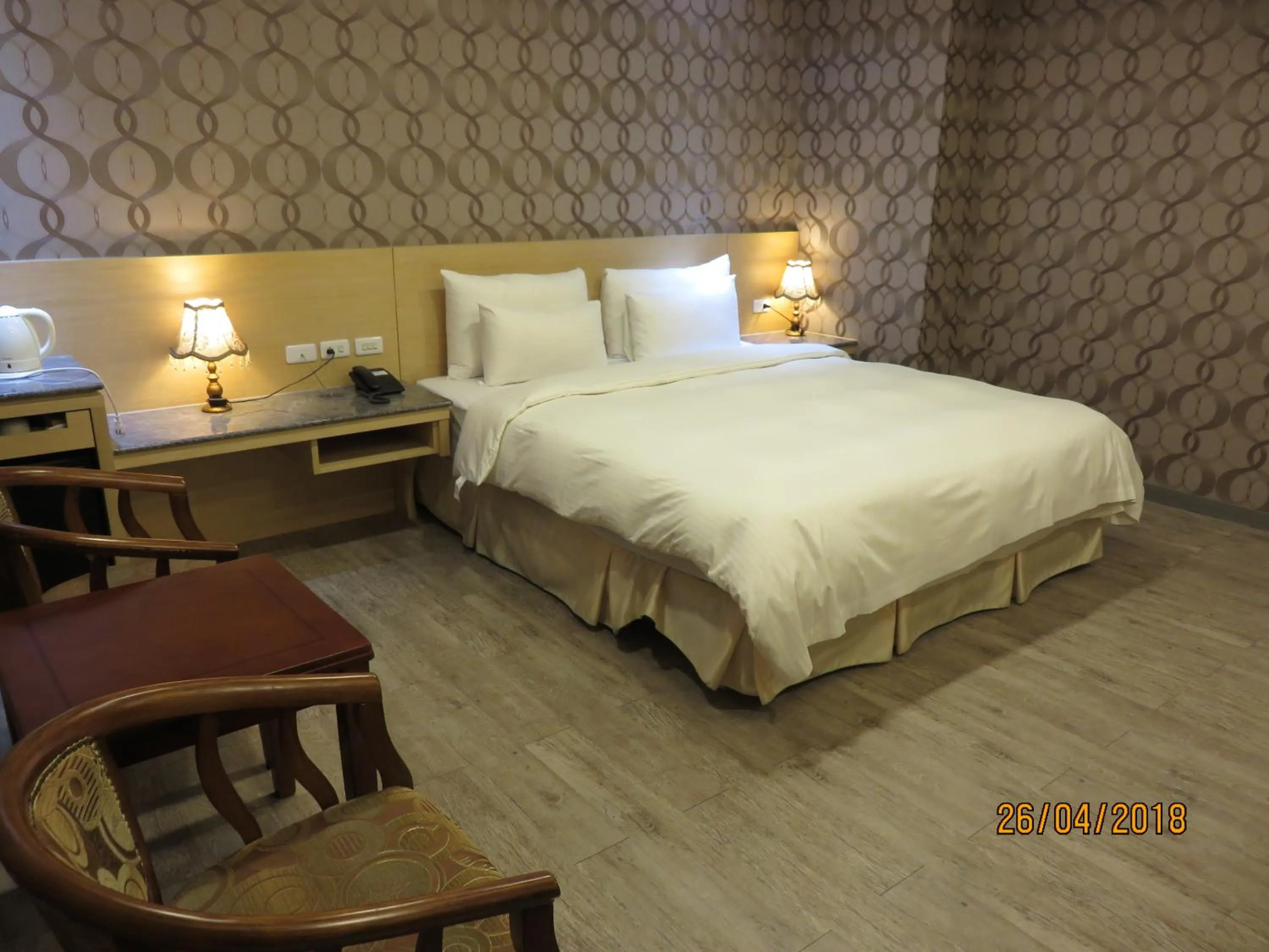 Bed in Mao Hua Motel