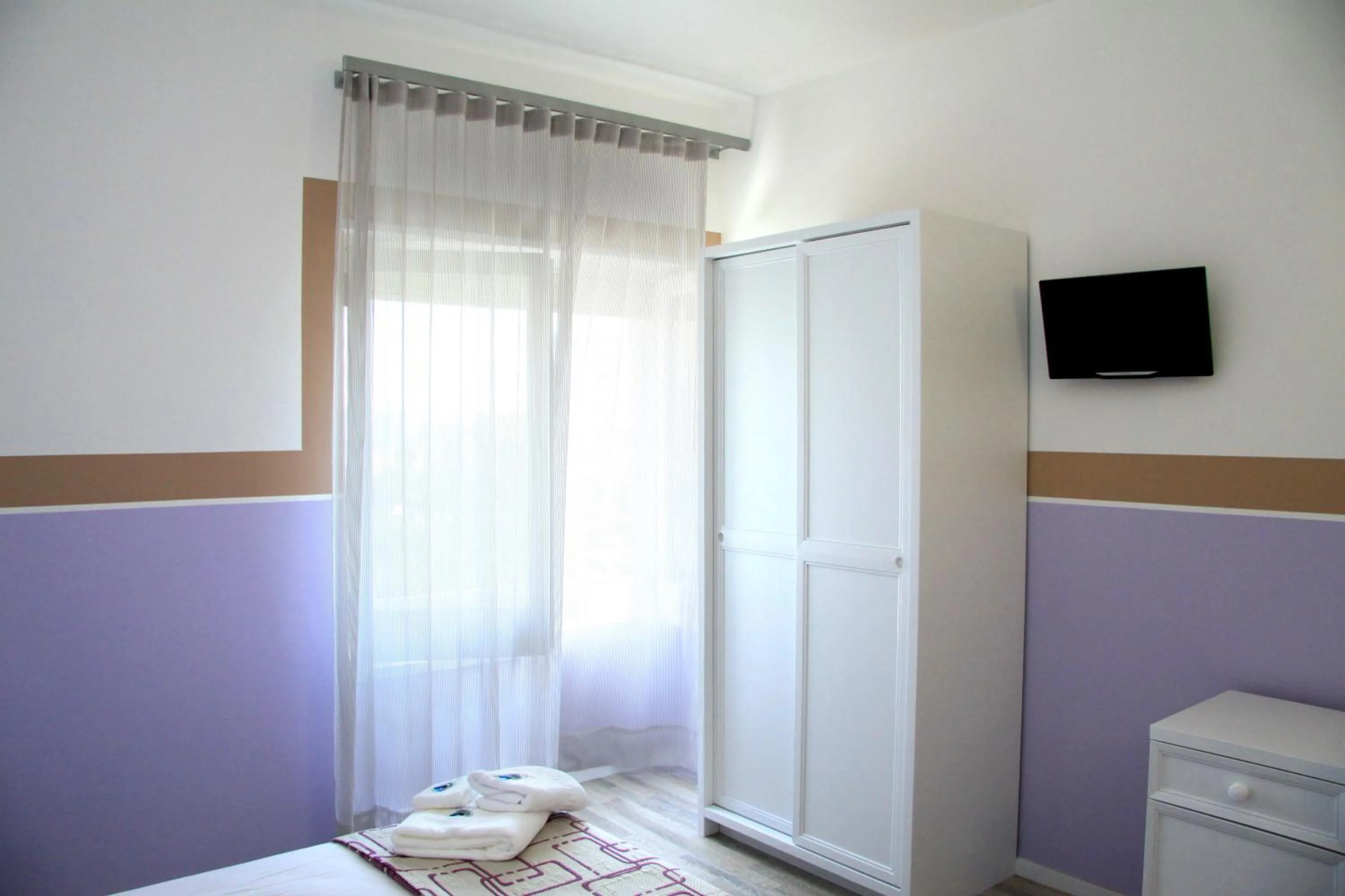 Bedroom in Hotel Città Bella