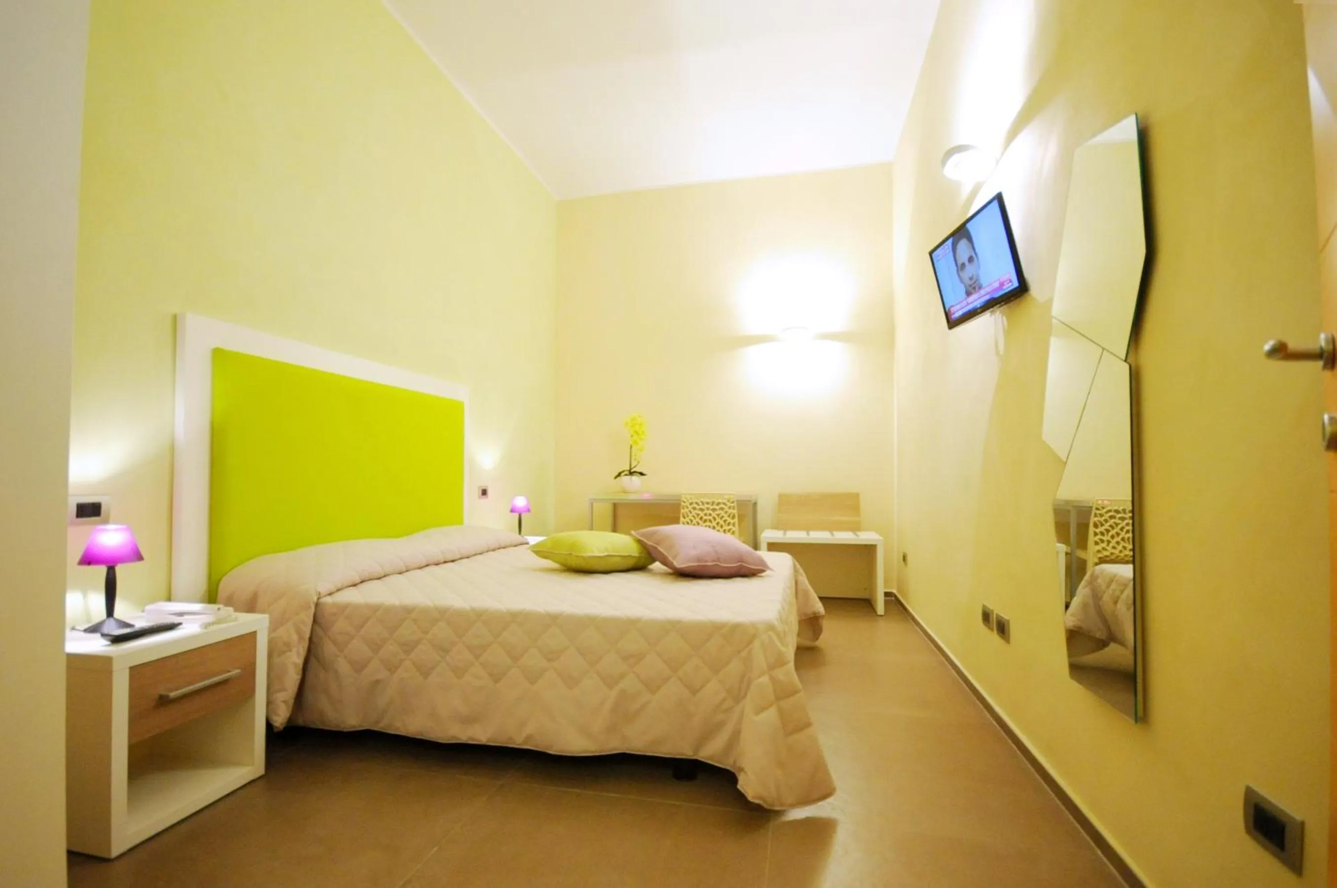 Bedroom in Hotel Città Bella