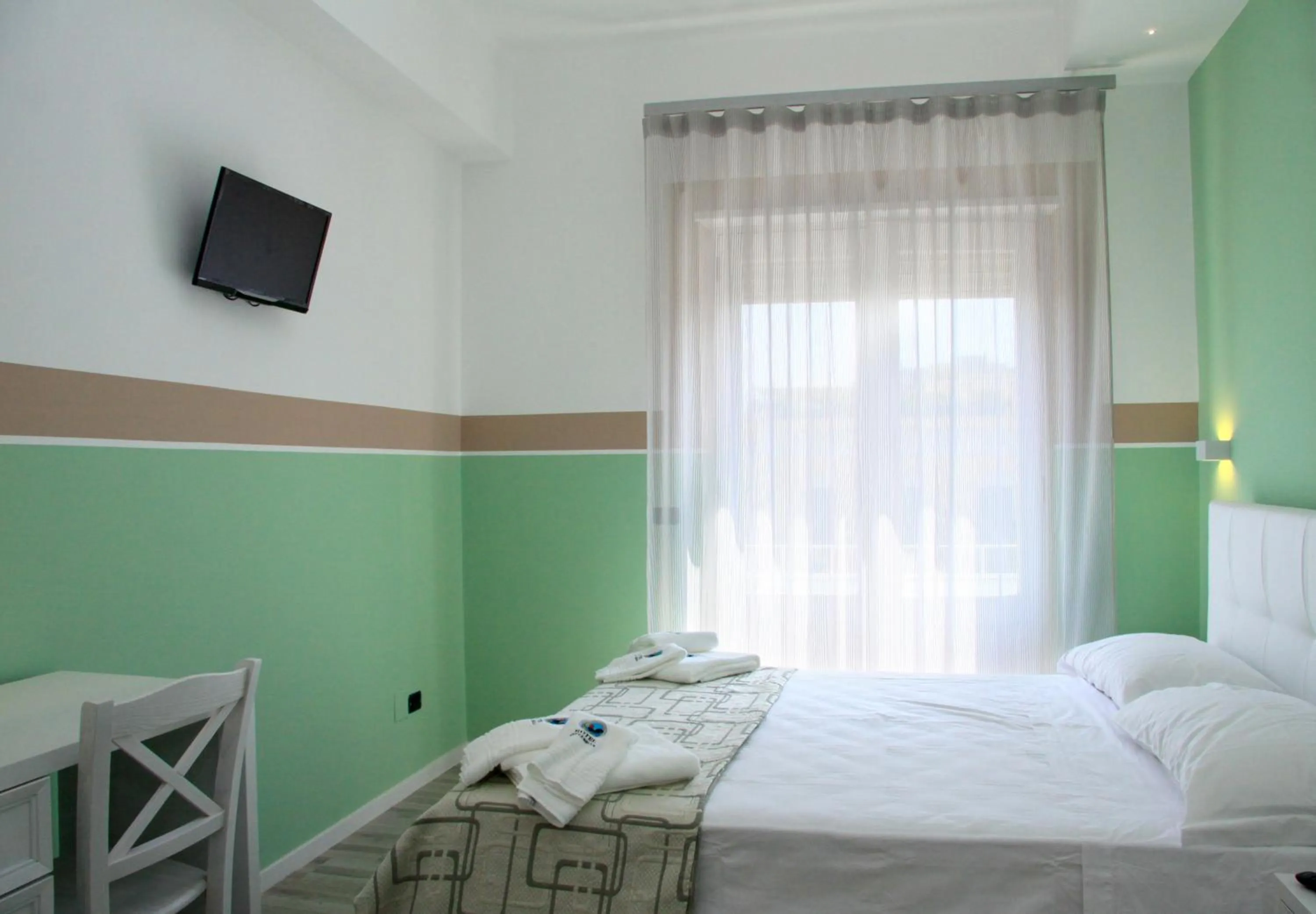 Bedroom in Hotel Città Bella