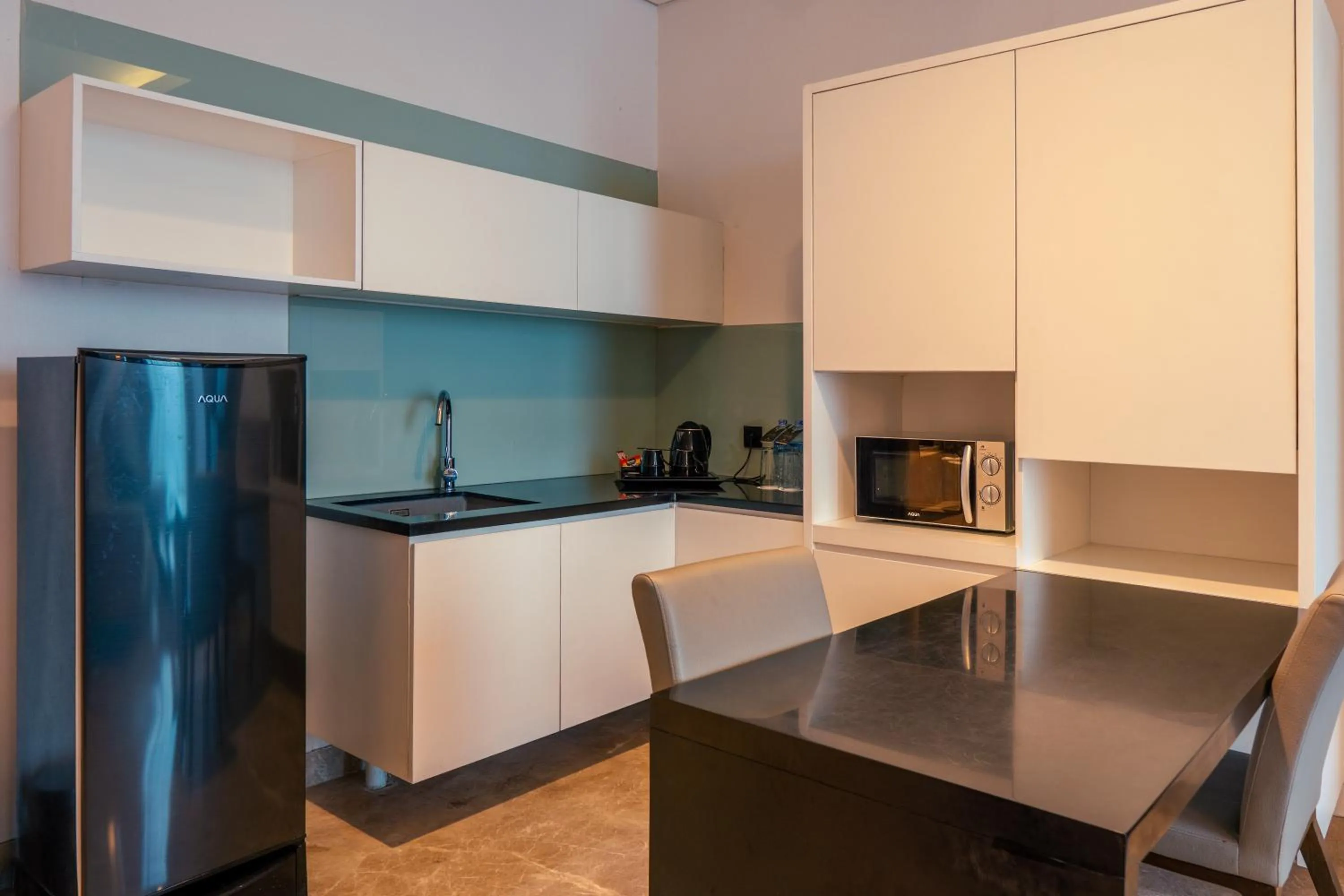 kitchen in Azana Suites Hotel Antasari