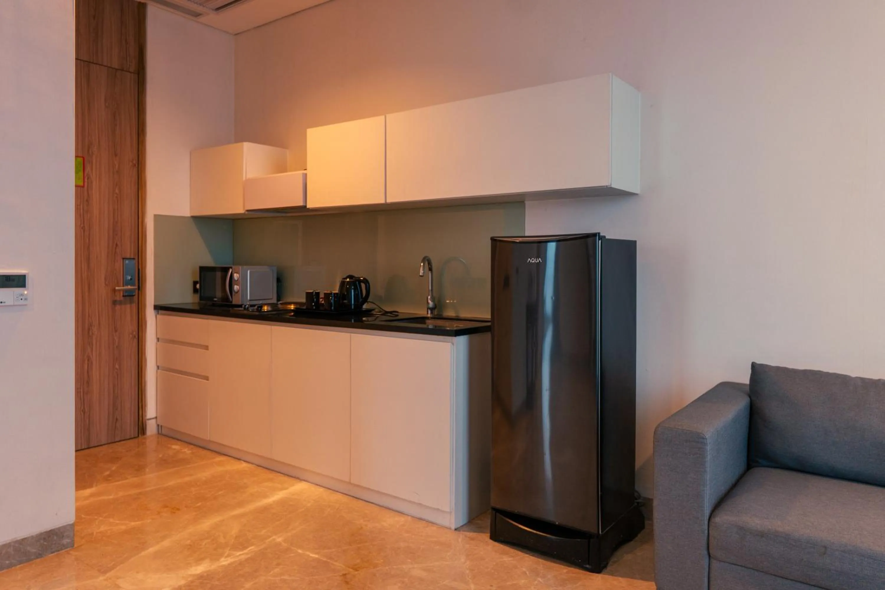 kitchen in Azana Suites Hotel Antasari