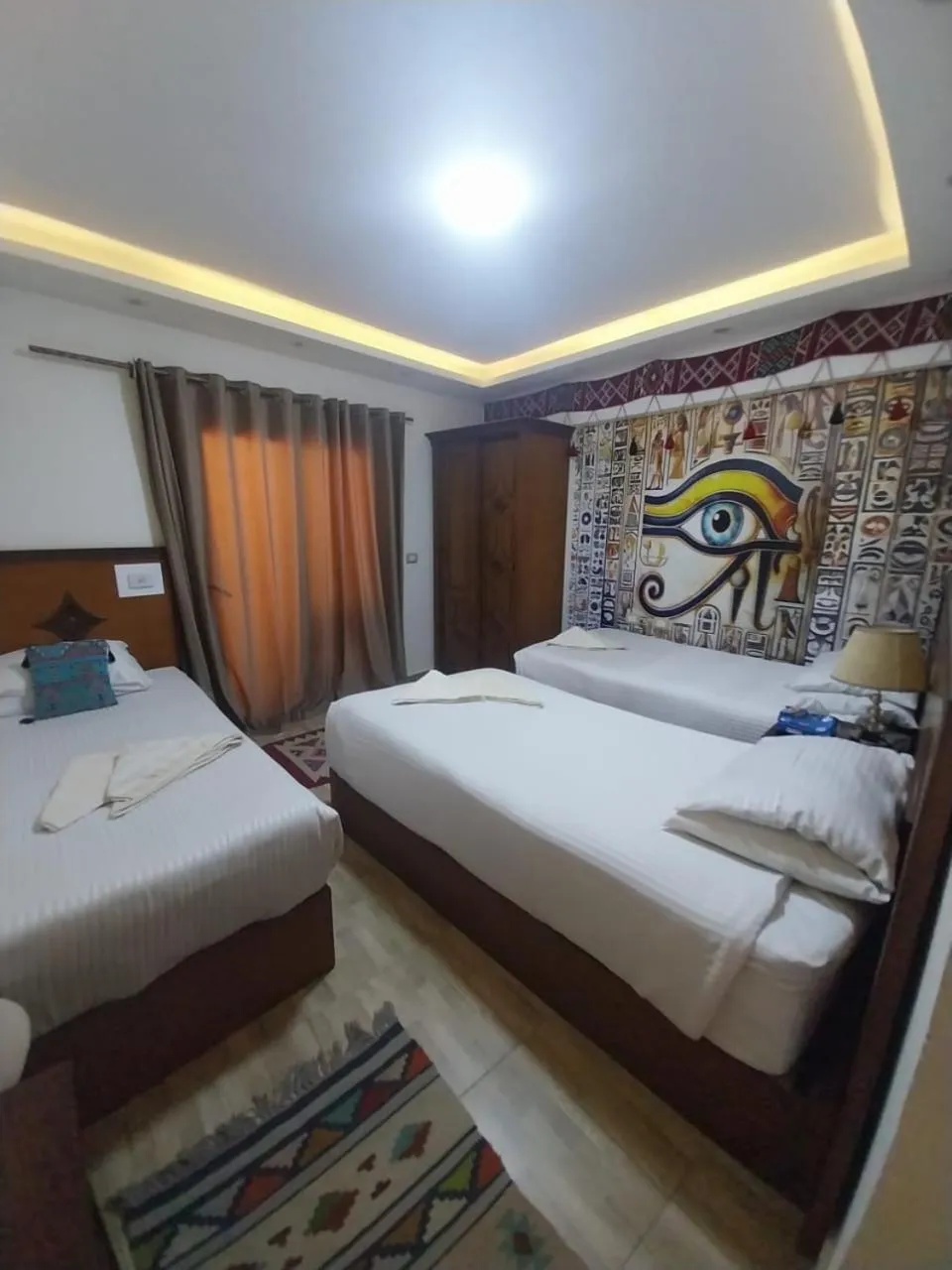 Bed in Atlantis Pyramids Inn