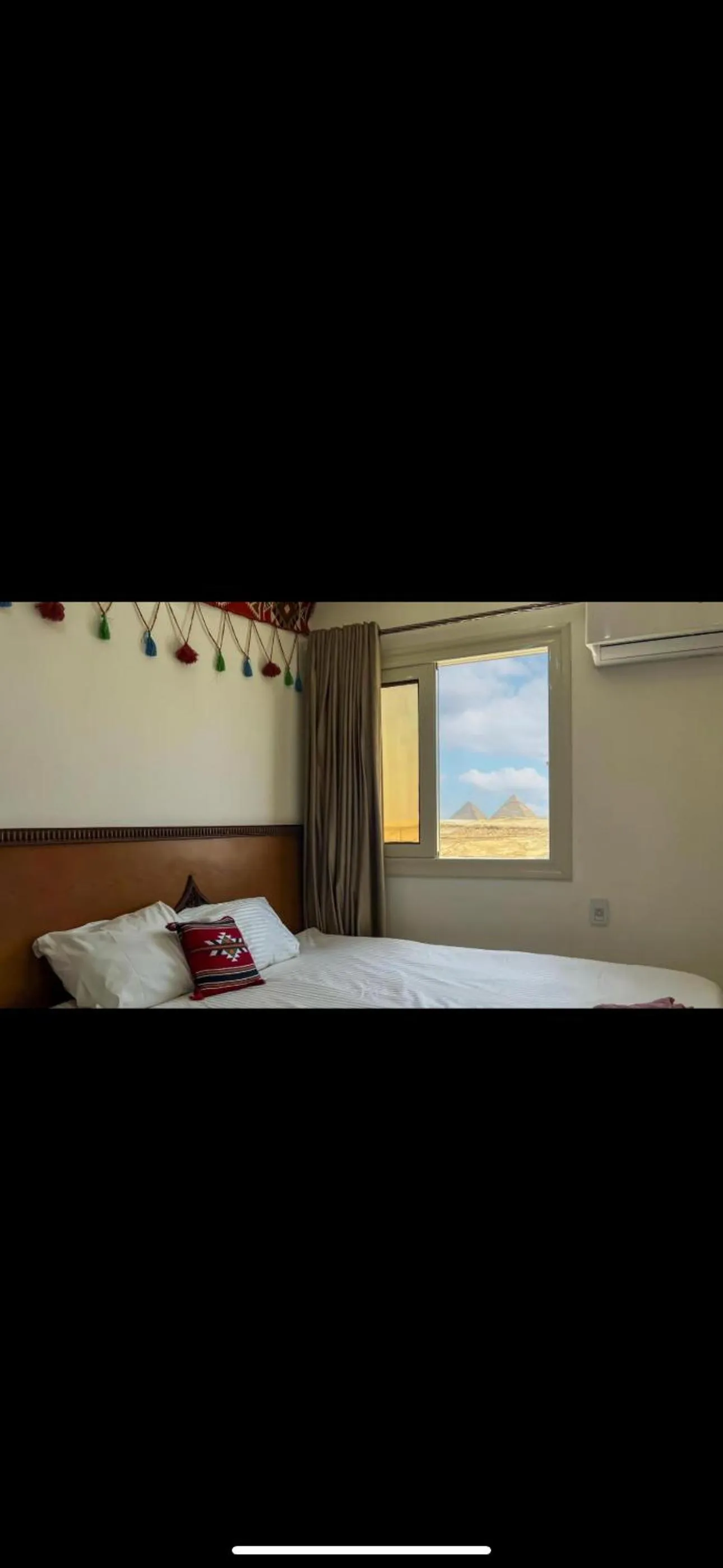 Bed in Atlantis Pyramids Inn