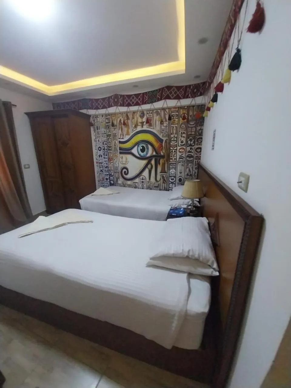 Bed in Atlantis Pyramids Inn