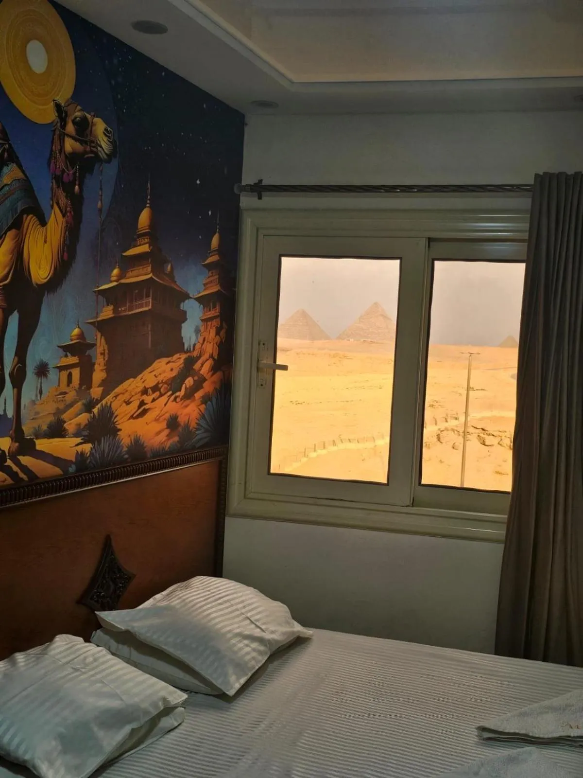 Bed in Atlantis Pyramids Inn