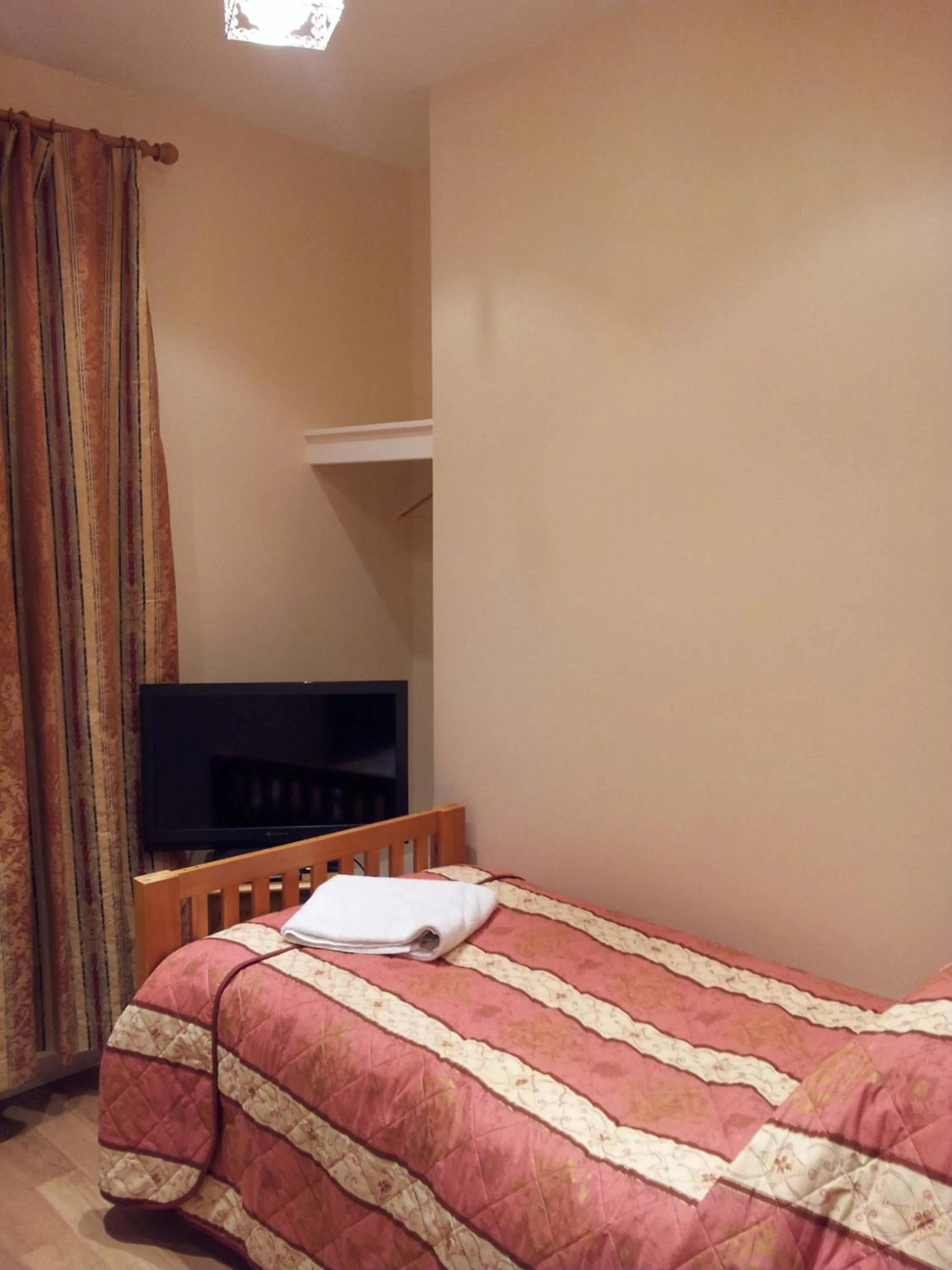 Bed in The Dharma Lodge