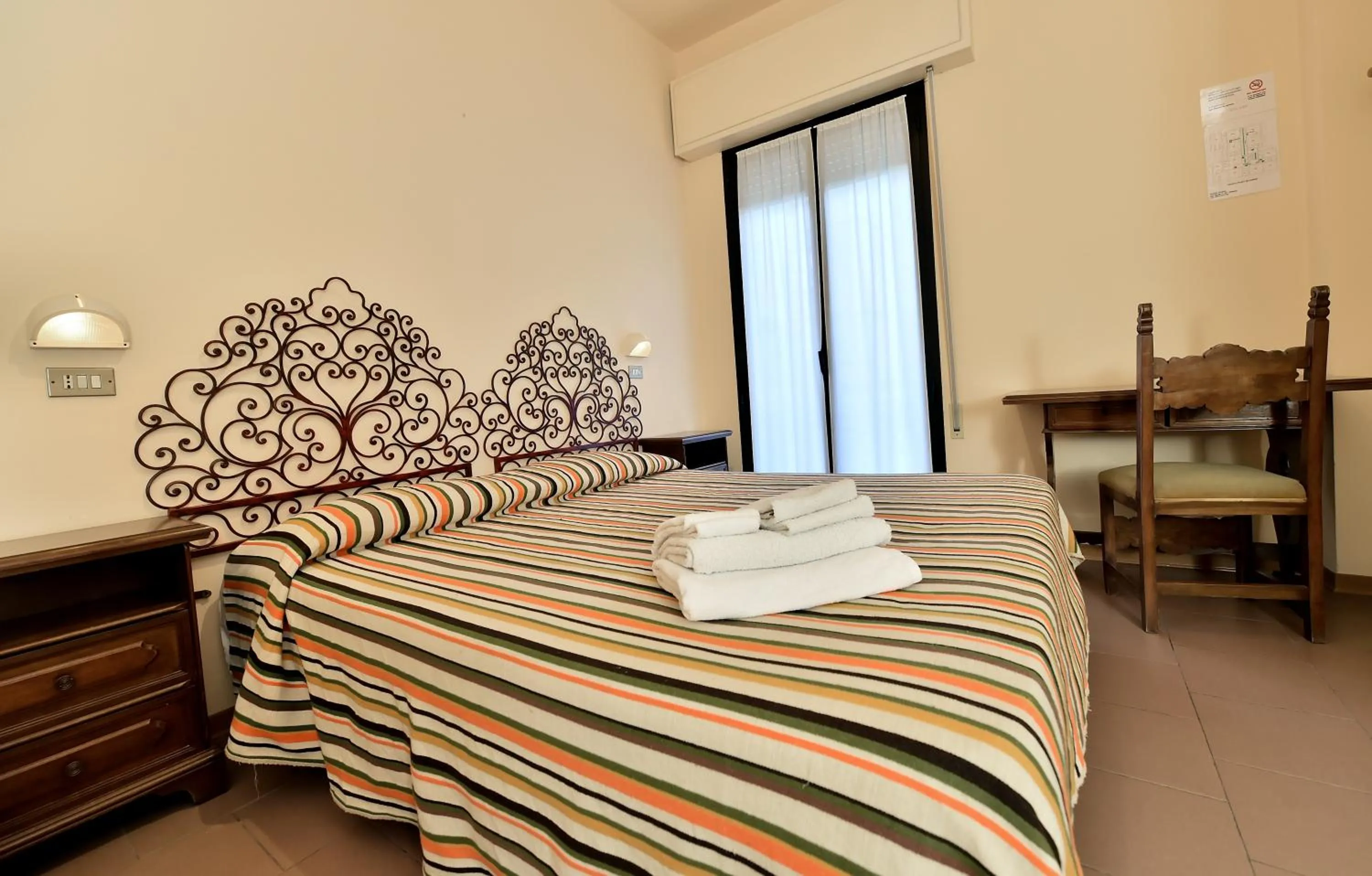 Bed in Hotel Doria