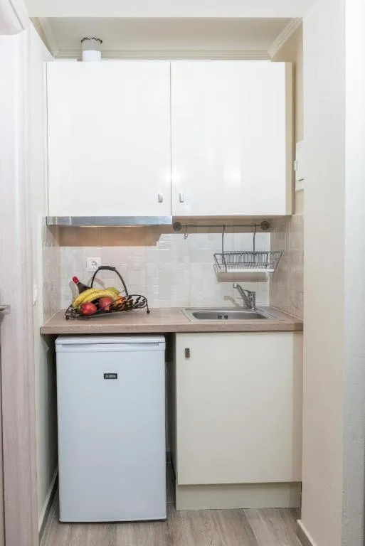 Kitchen or kitchenette in Ammos Beach Seaside Luxury Suites Hotel