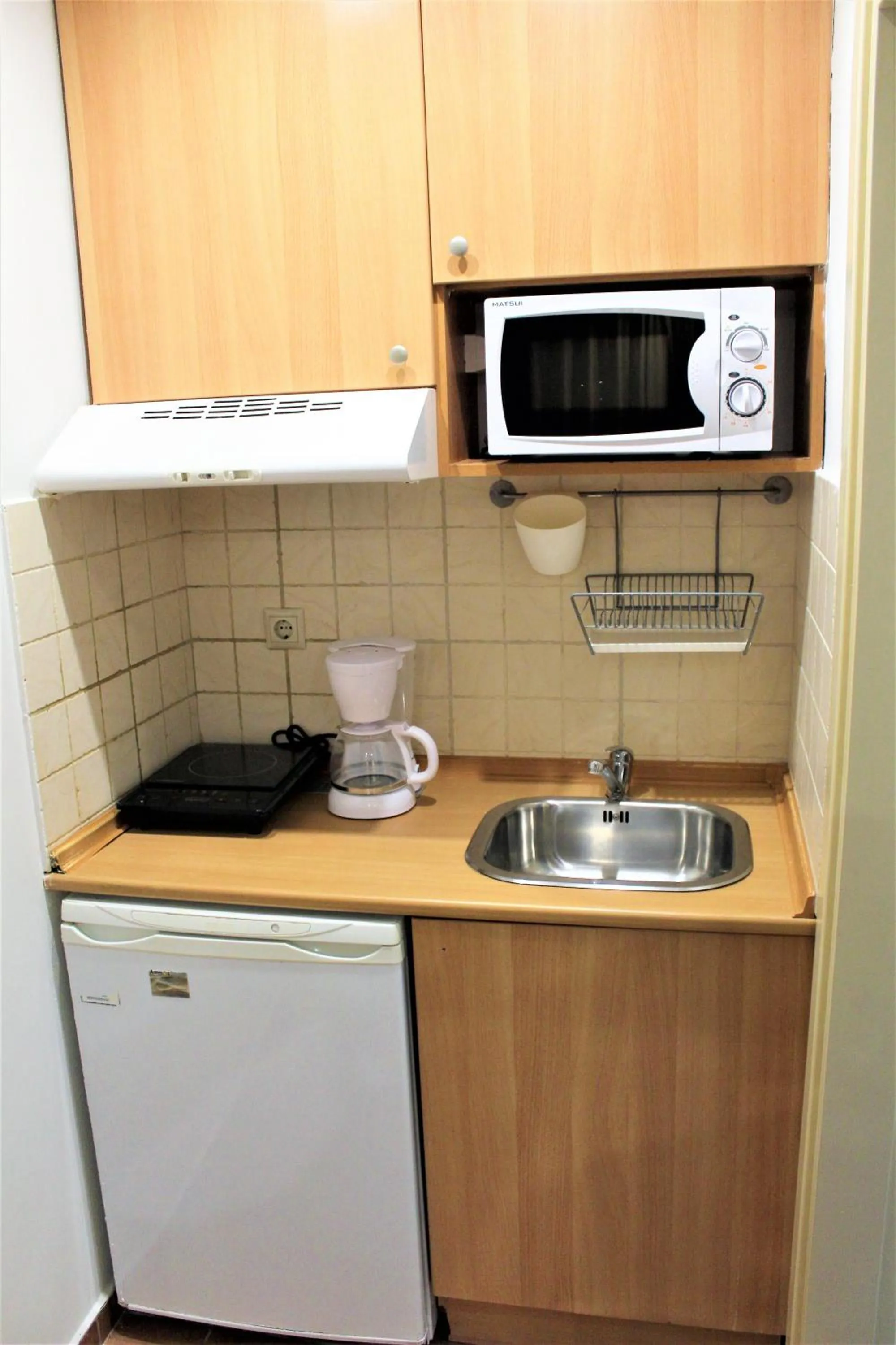 Kitchen or kitchenette in Ammos Beach Seaside Luxury Suites Hotel