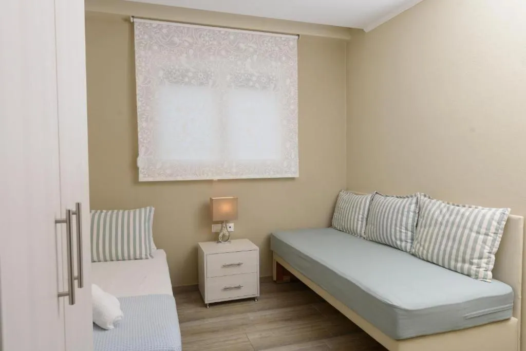 Photo of the whole room, Bed in Ammos Beach Seaside Luxury Suites Hotel