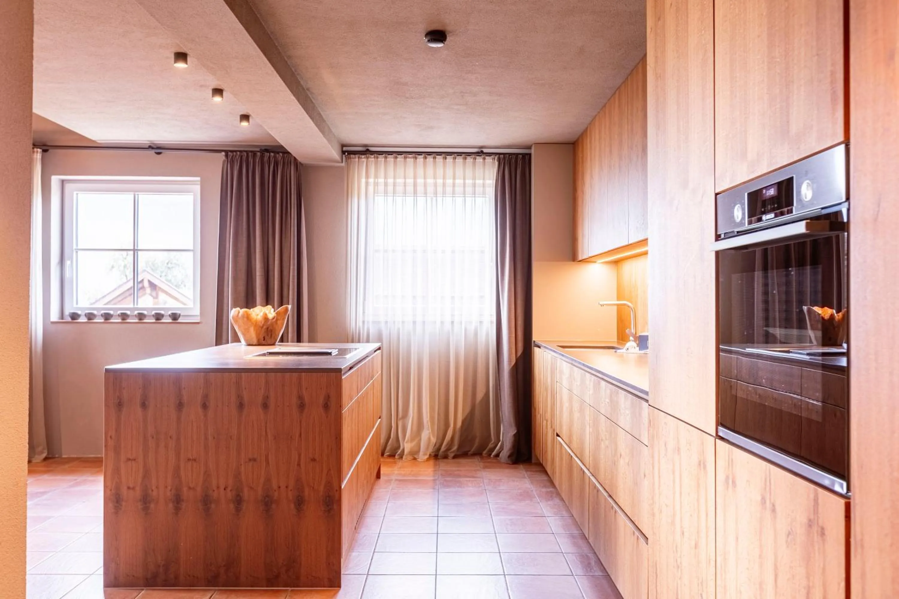 Kitchen or kitchenette in Tauernsuites Mitterwirt by ALPS RESORTS