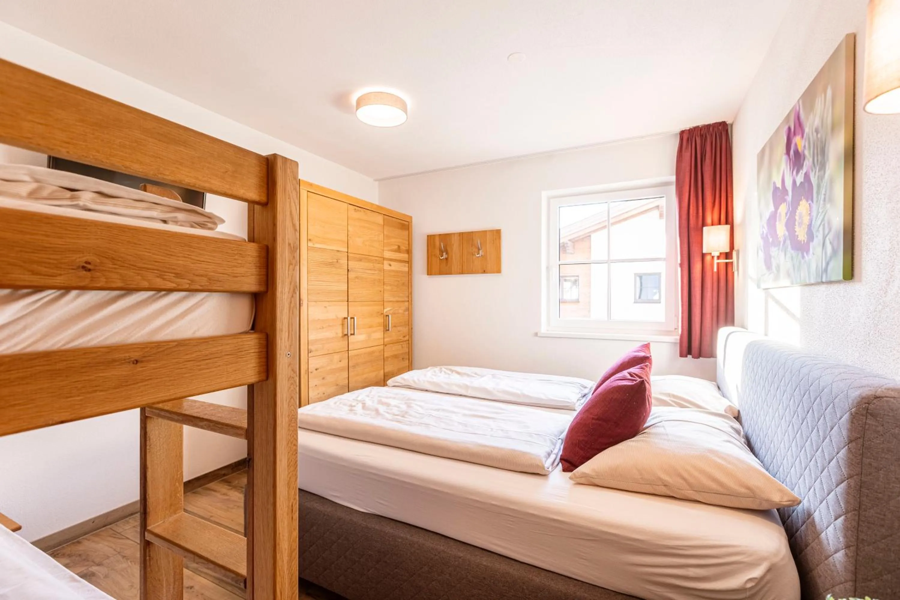 Bed in Tauernsuites Mitterwirt by ALPS RESORTS