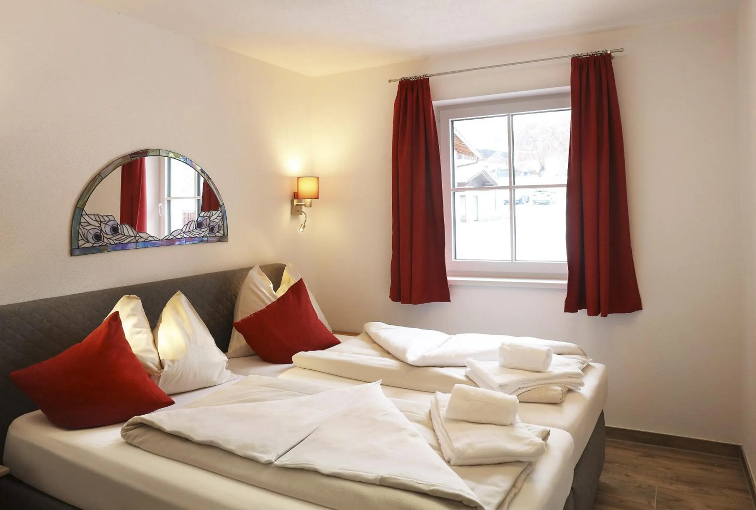 Bed in Tauernsuites Mitterwirt by ALPS RESORTS