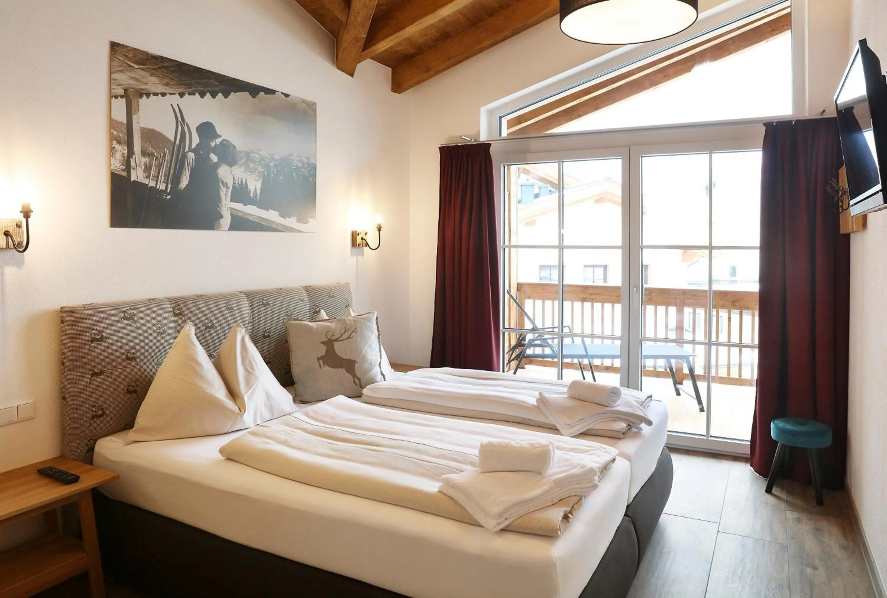 Bed in Tauernsuites Mitterwirt by ALPS RESORTS