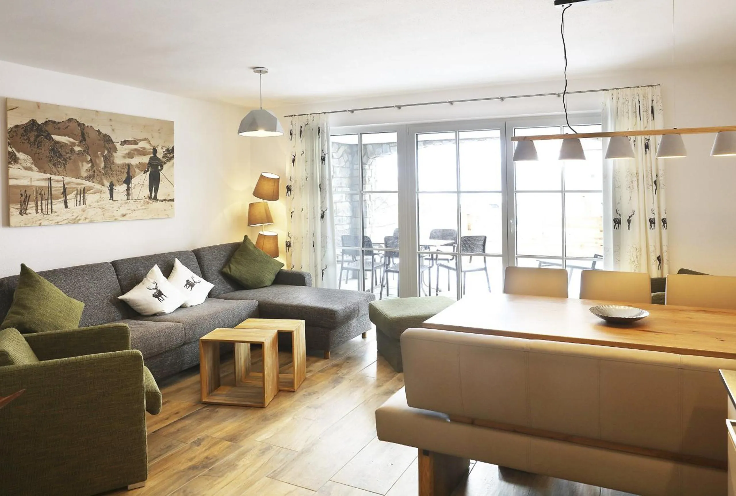 Living room in Tauernsuites Mitterwirt by ALPS RESORTS