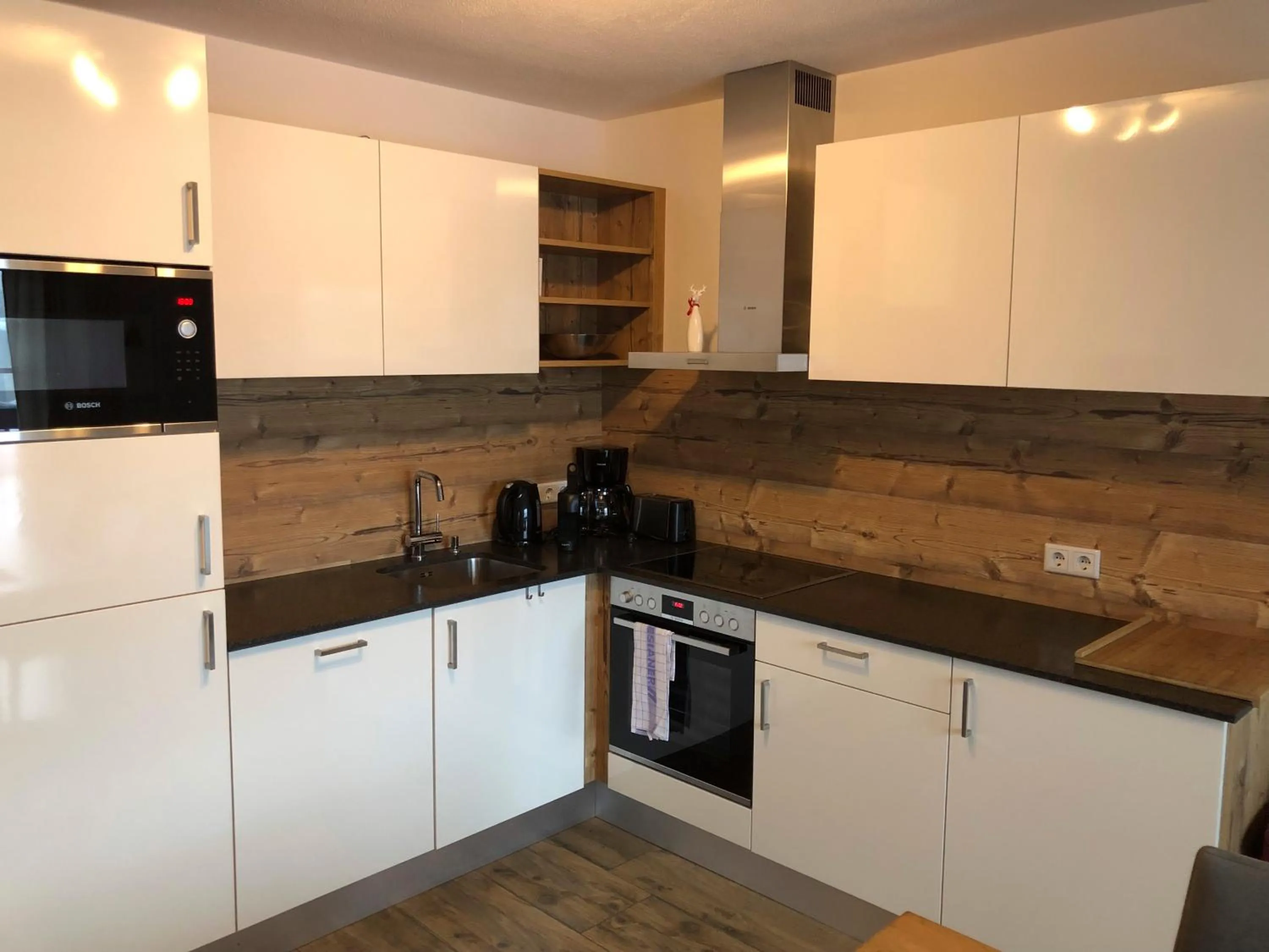 kitchen in Tauernsuites Mitterwirt by ALPS RESORTS